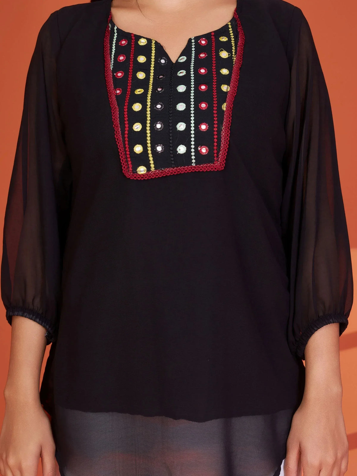 Black ethnic kurti with colorful mirror and thread embroidery, sheer sleeves, V-neck design