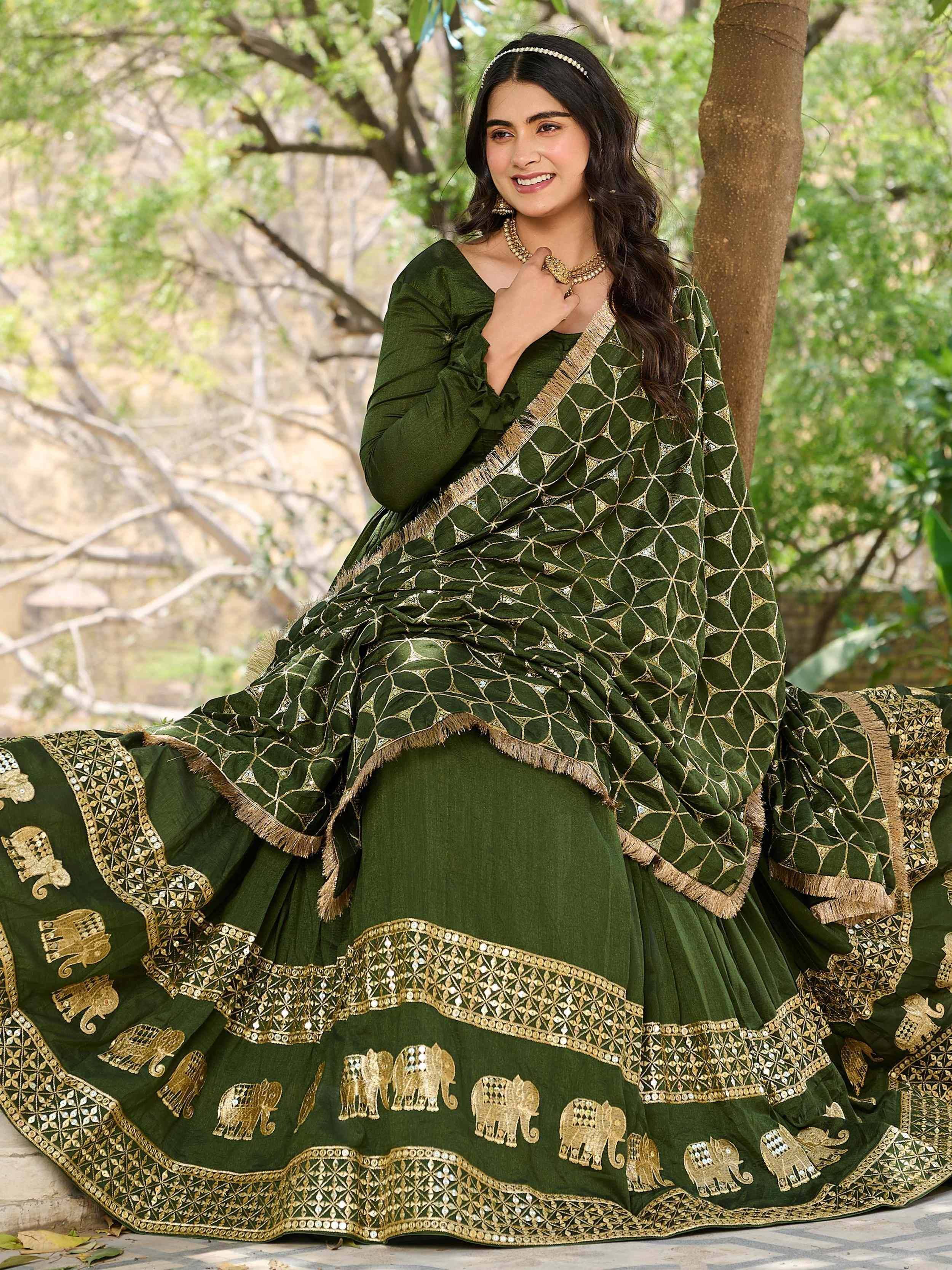 Cream floral embroidered lehenga with green dupatta, perfect for Indian ethnic wear occasions.