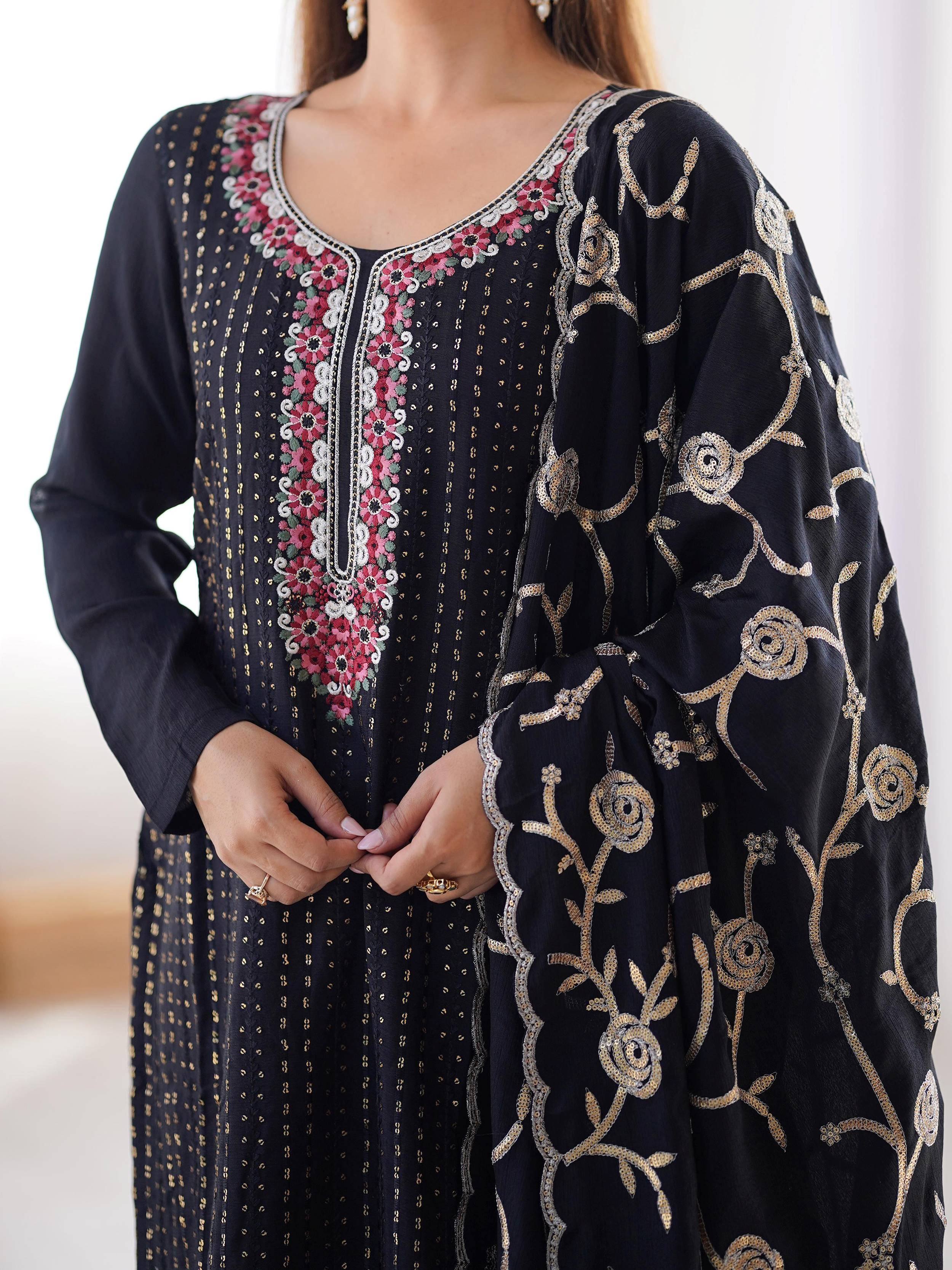 Black ethnic kurti with pink floral embroidery and gold threadwork, perfect for Indian wear