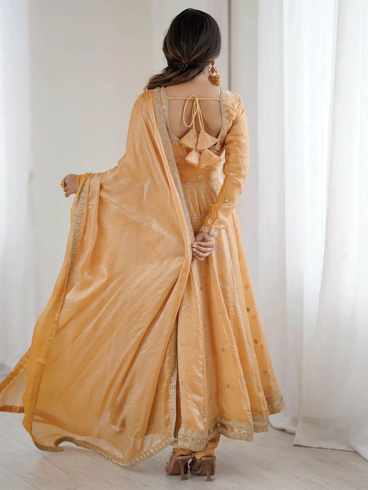 Elegant mustard yellow anarkali with gold embroidery and back tie detail