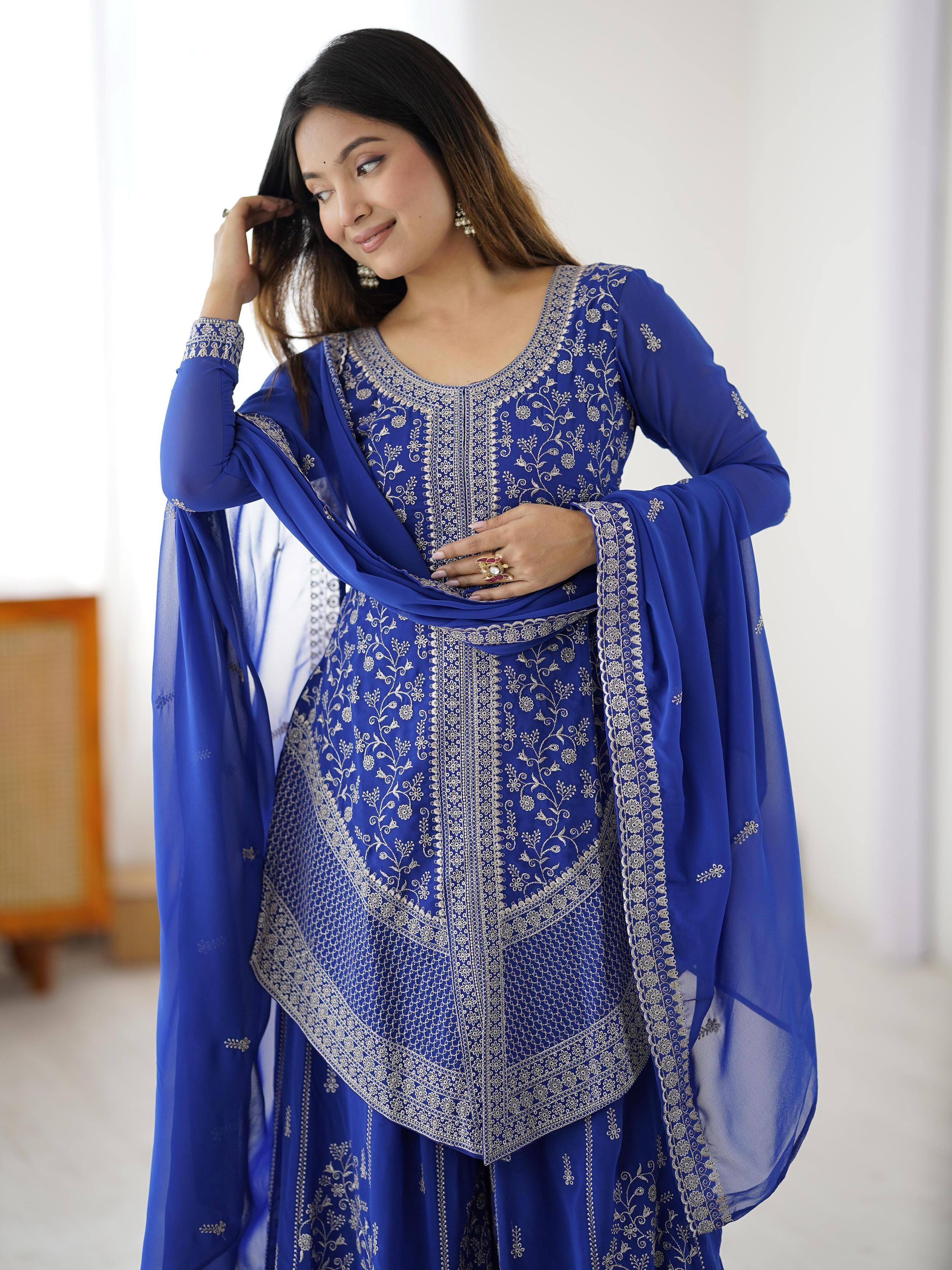 Royal blue embroidered salwar kameez with floral zari work and matching dupatta, perfect for Indian ethnic occasions.
