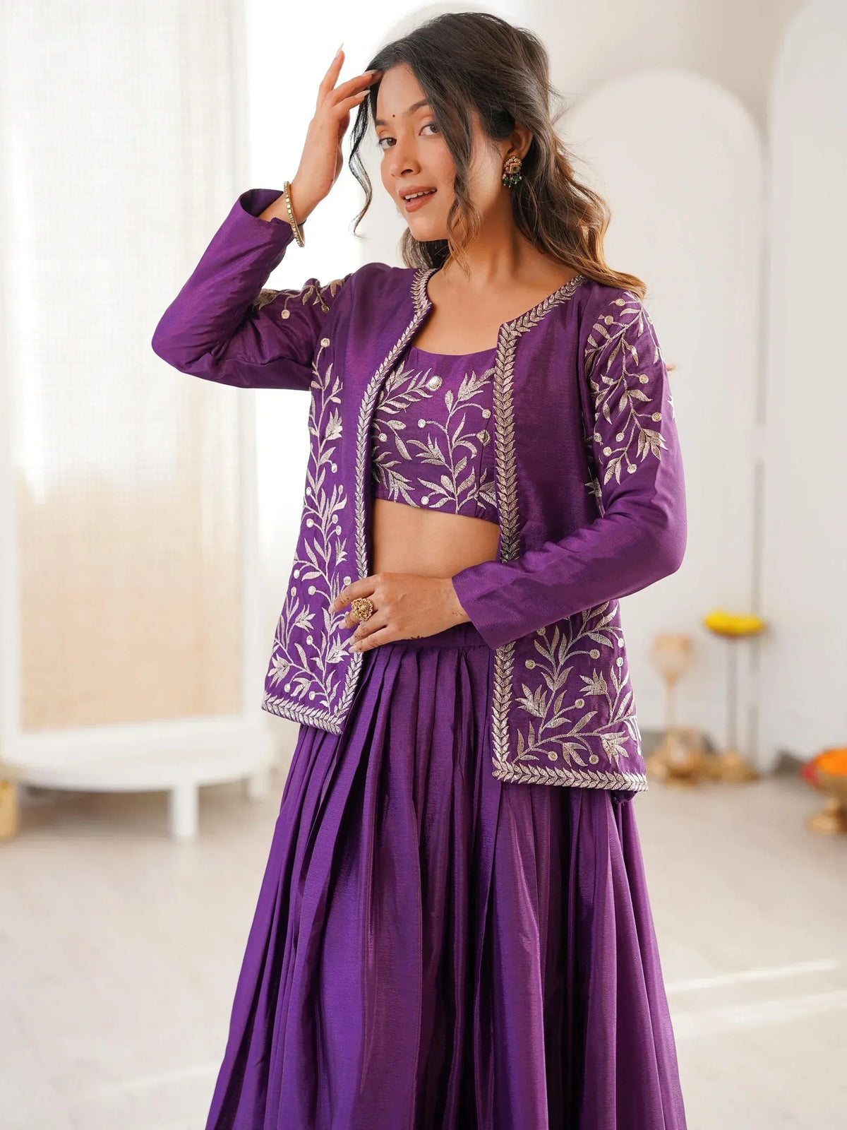 Purple embroidered lehenga choli with floral gold detailing, perfect for Indian ethnic wear occasions