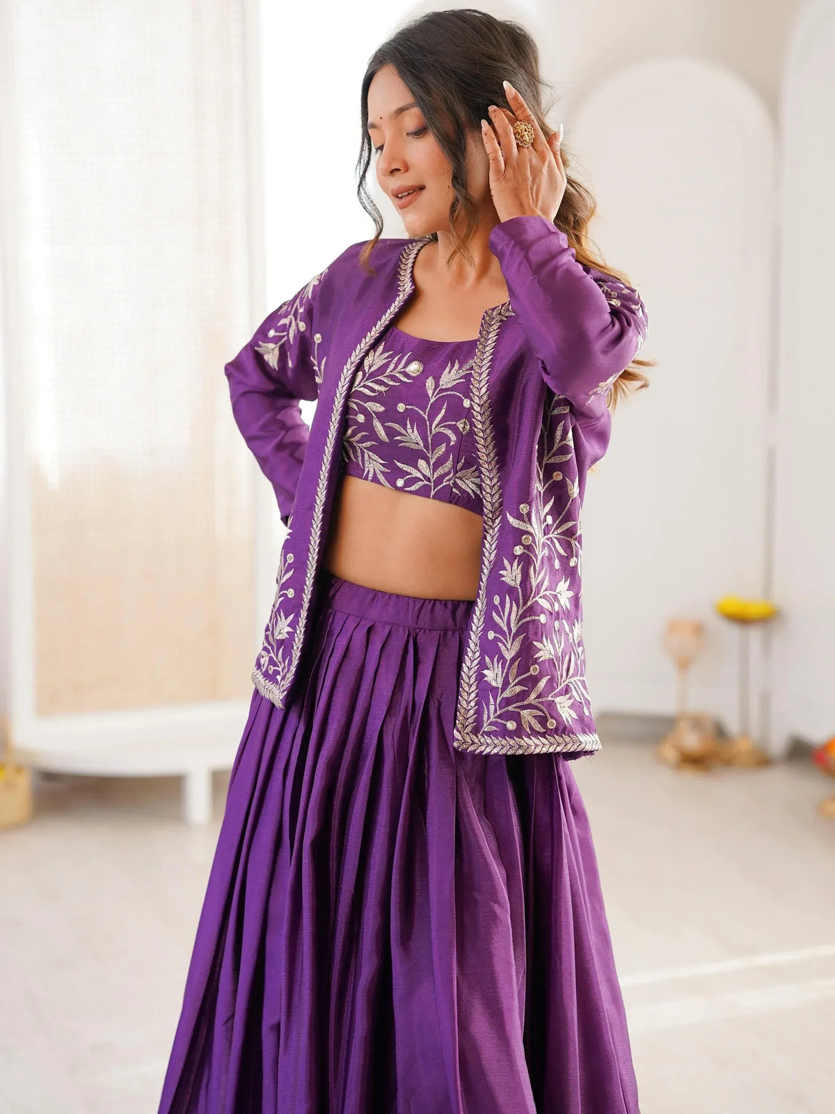 Purple embroidered lehenga choli with floral zari work, perfect for Indian ethnic wear occasions