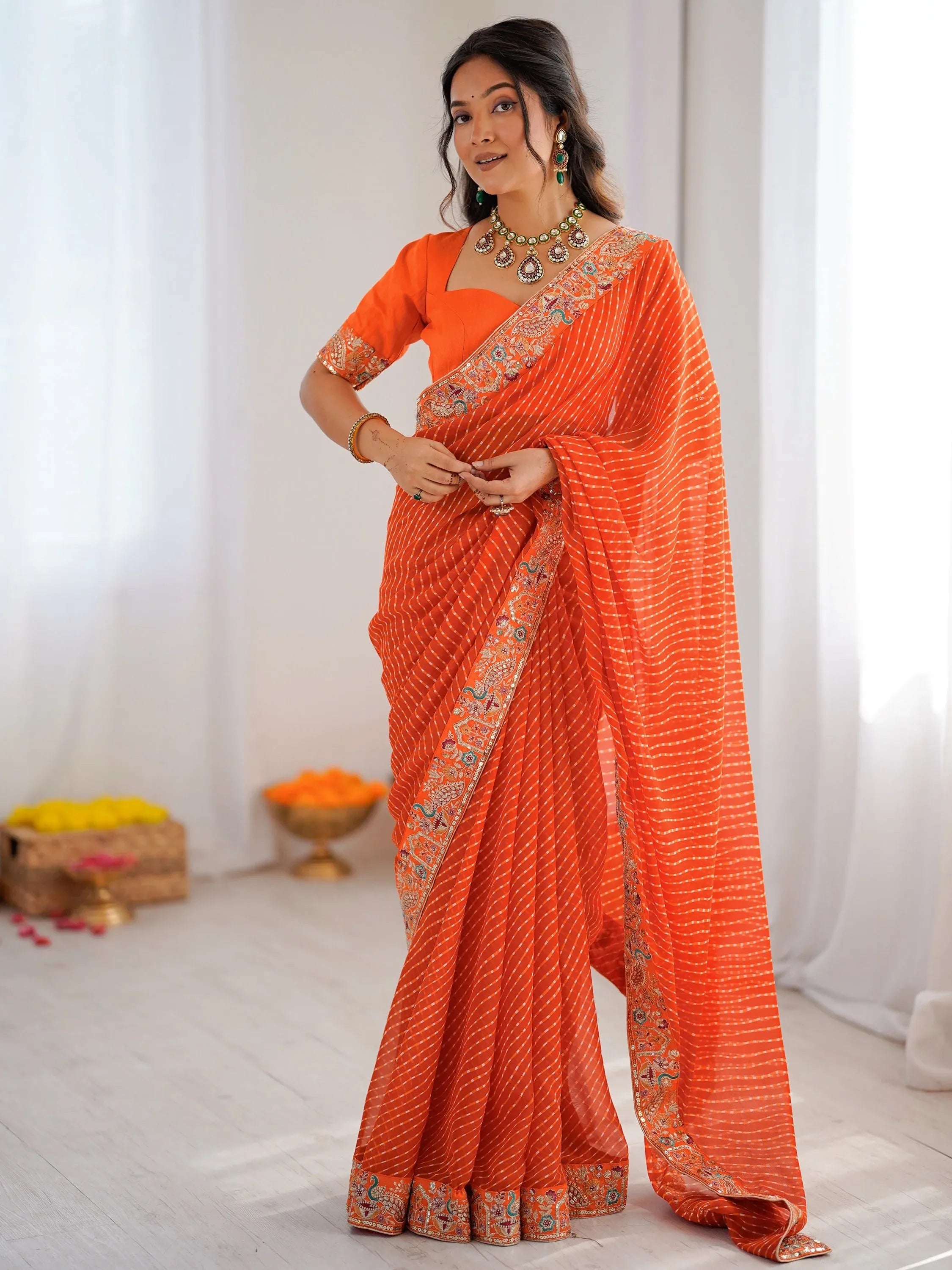 Beautiful Orange Laheriya Printed Georgette Festive Wear Saree With Blouse