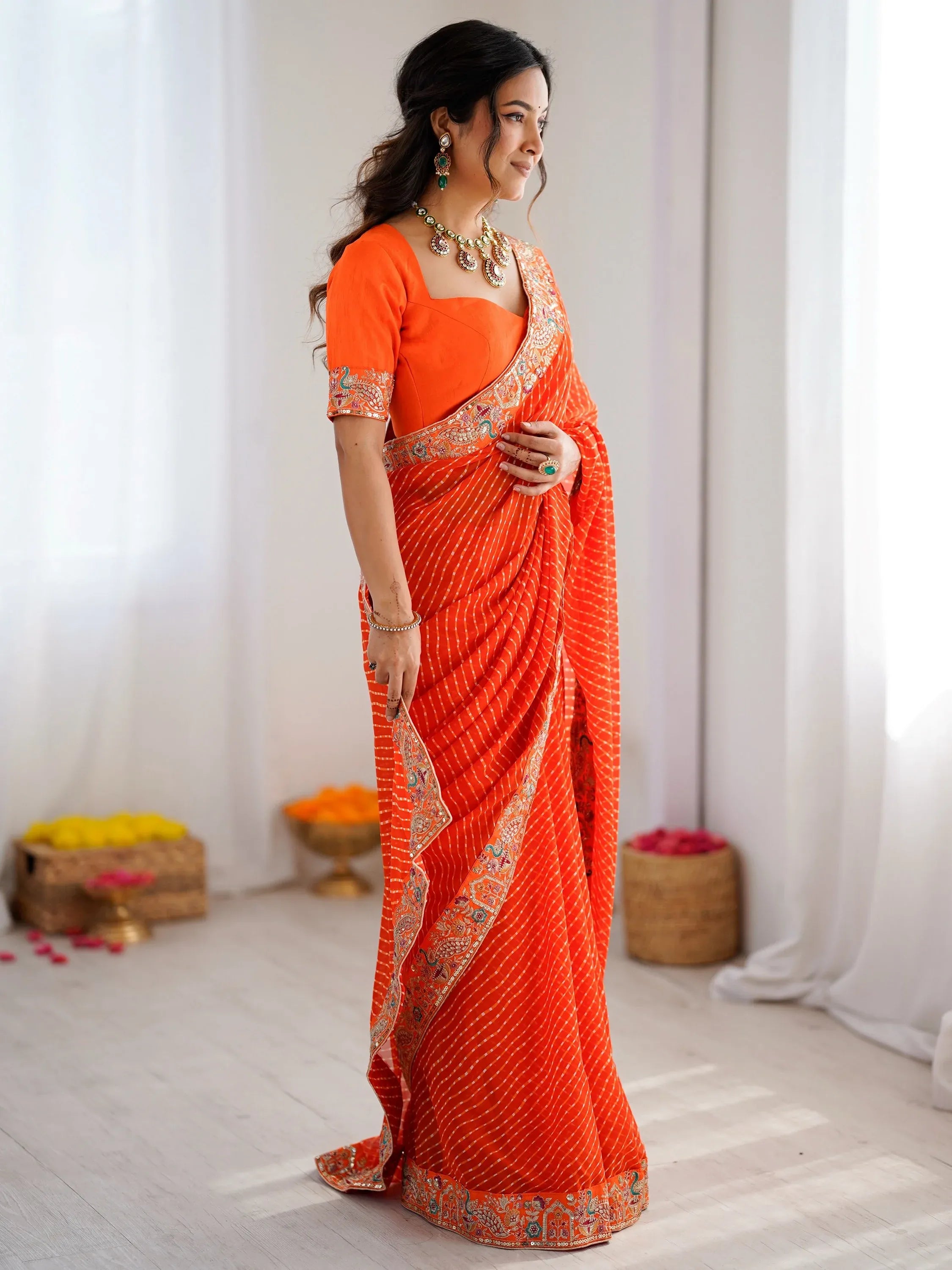 Beautiful Orange Laheriya Printed Georgette Festive Wear Saree With Blouse