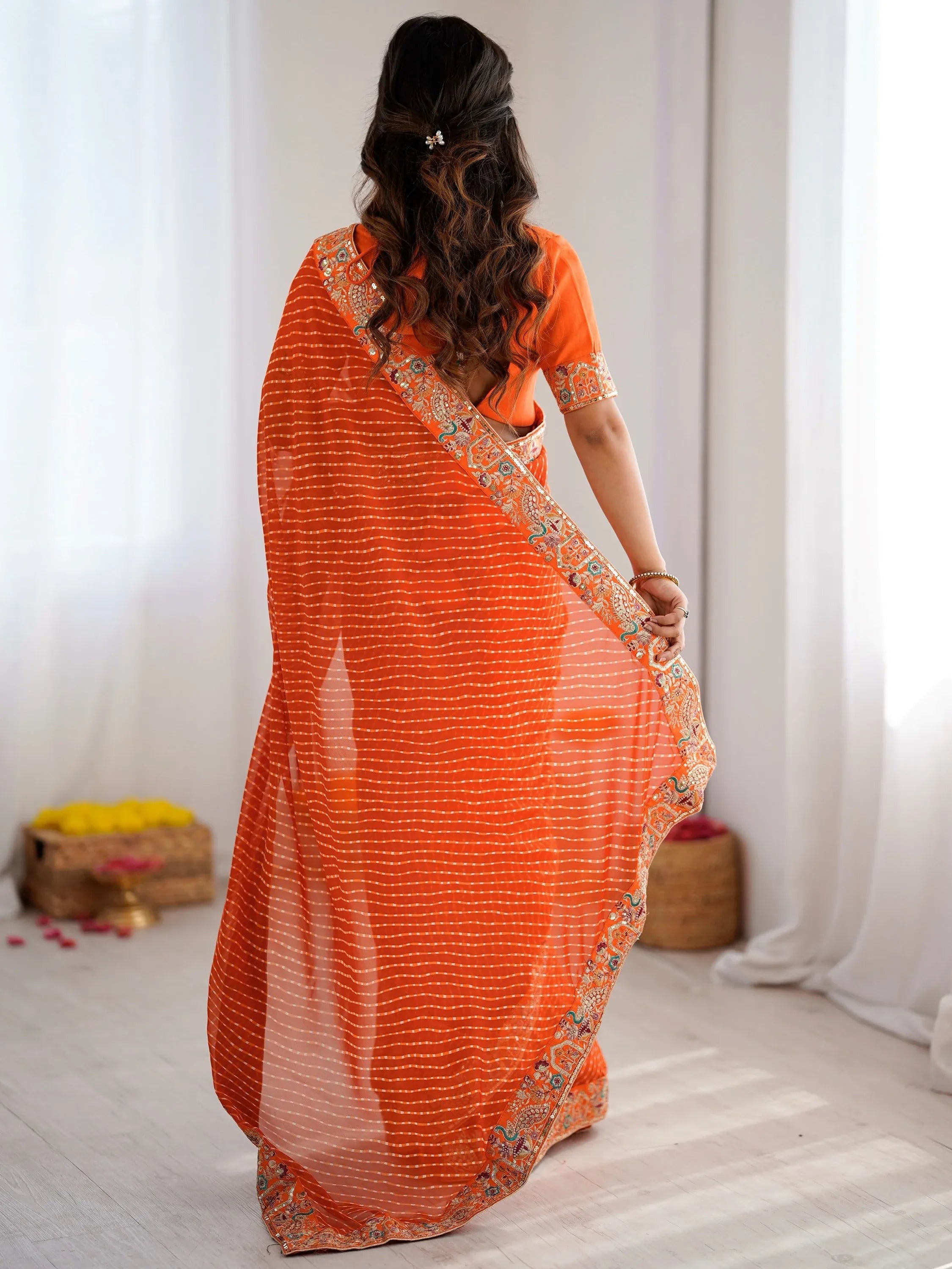Beautiful Orange Laheriya Printed Georgette Festive Wear Saree With Blouse