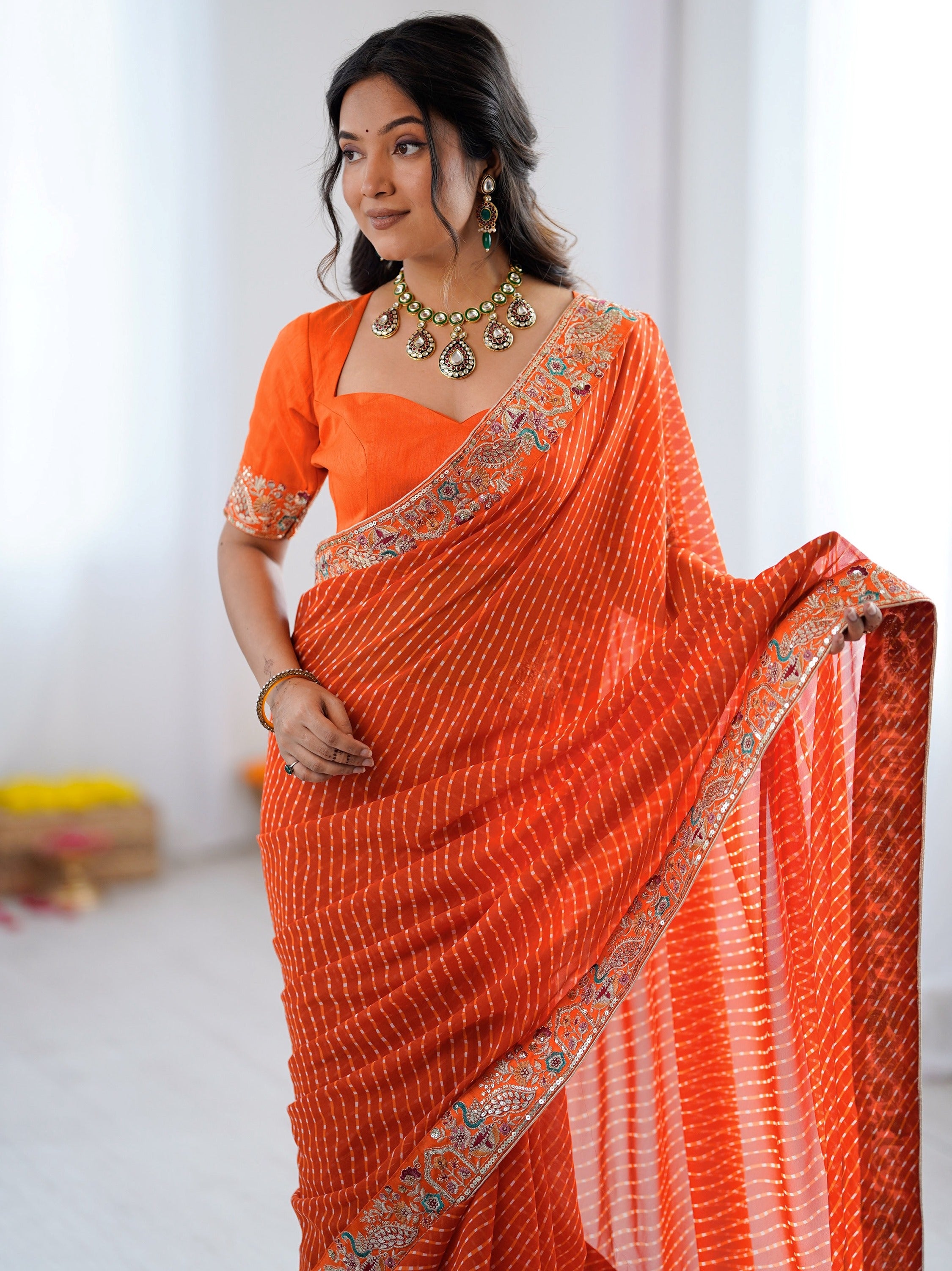 Beautiful Orange Laheriya Printed Georgette Festive Wear Saree With Blouse