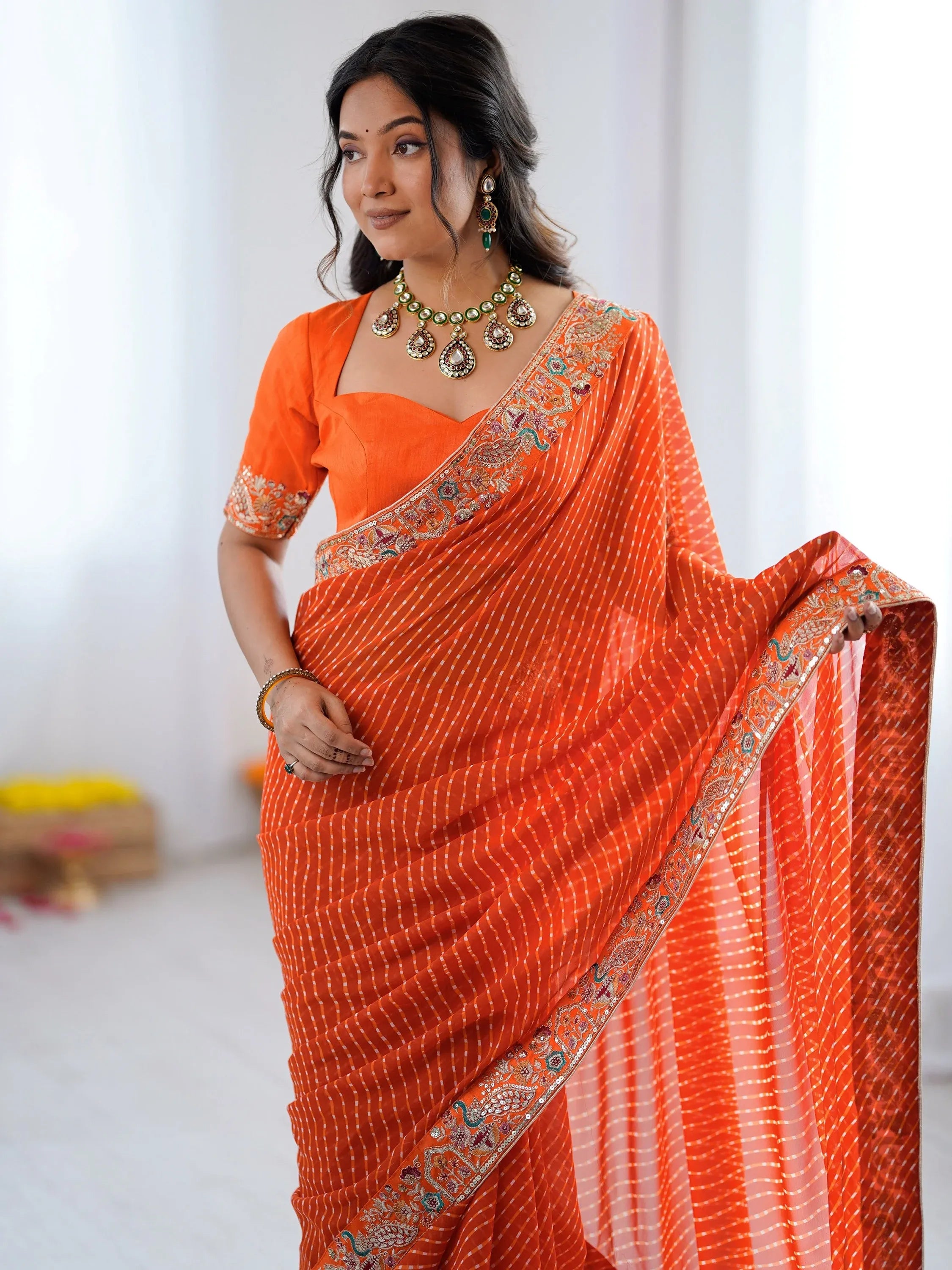 Beautiful Orange Laheriya Printed Georgette Festive Wear Saree With Blouse