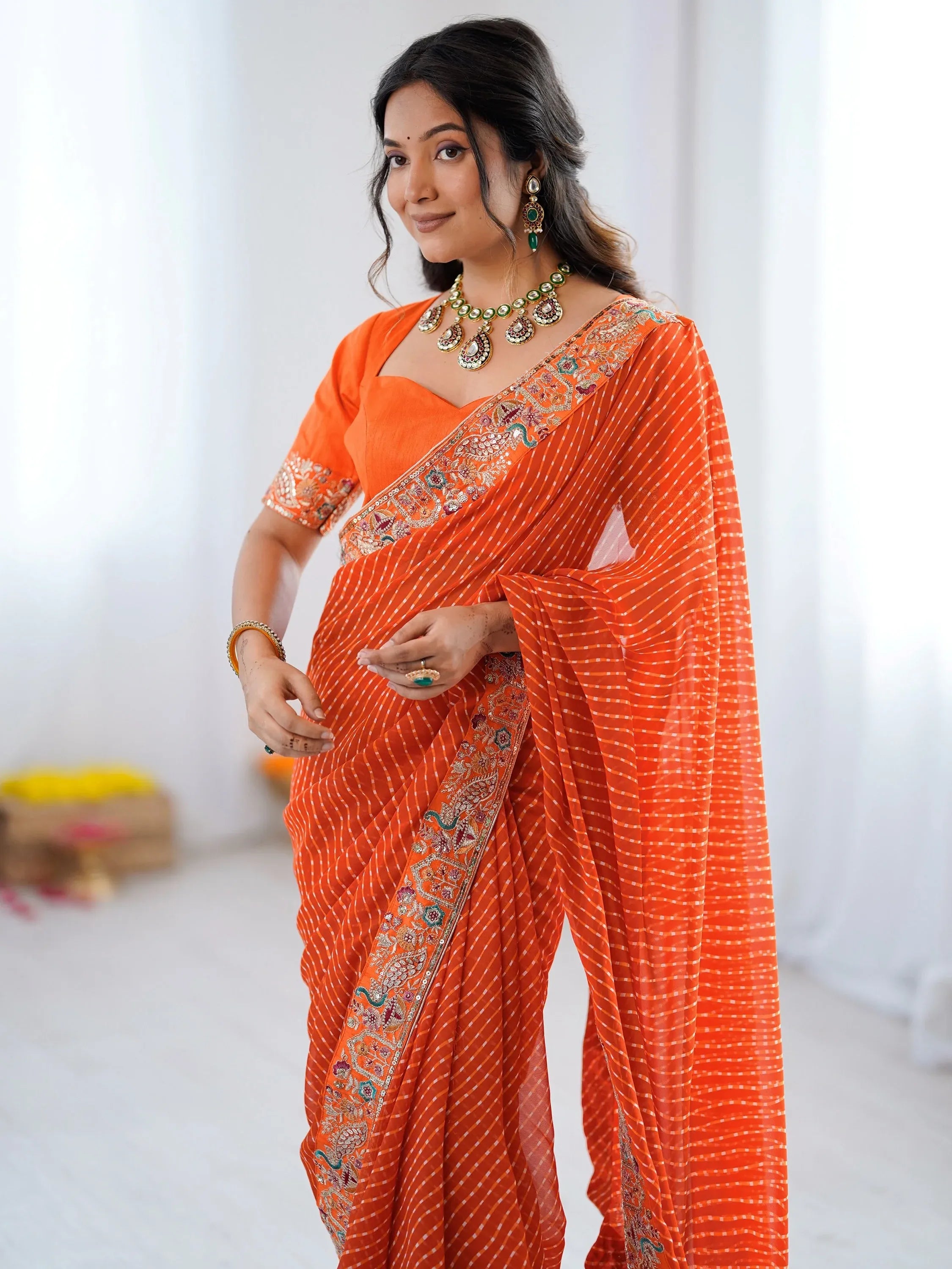 Beautiful Orange Laheriya Printed Georgette Festive Wear Saree With Blouse