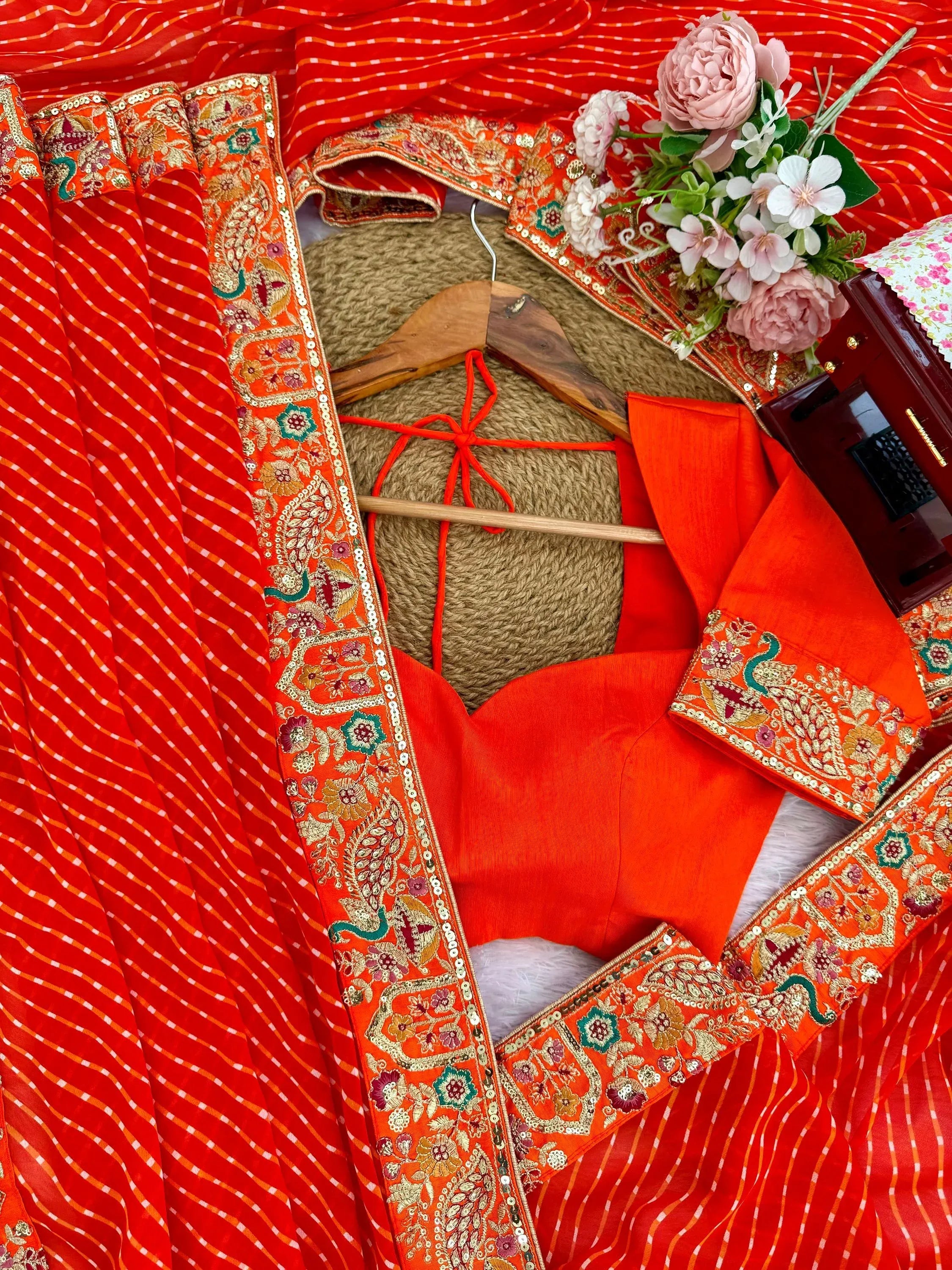 Beautiful Orange Laheriya Printed Georgette Festive Wear Saree With Blouse