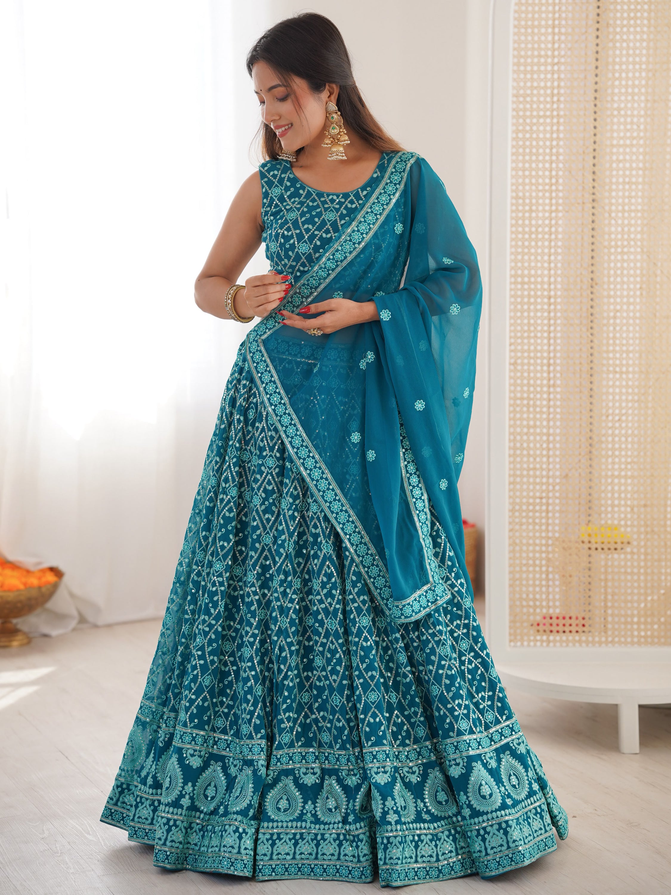 Dazzling Teal Blue Thread Work Georgette Function Wear Lehenga Choli