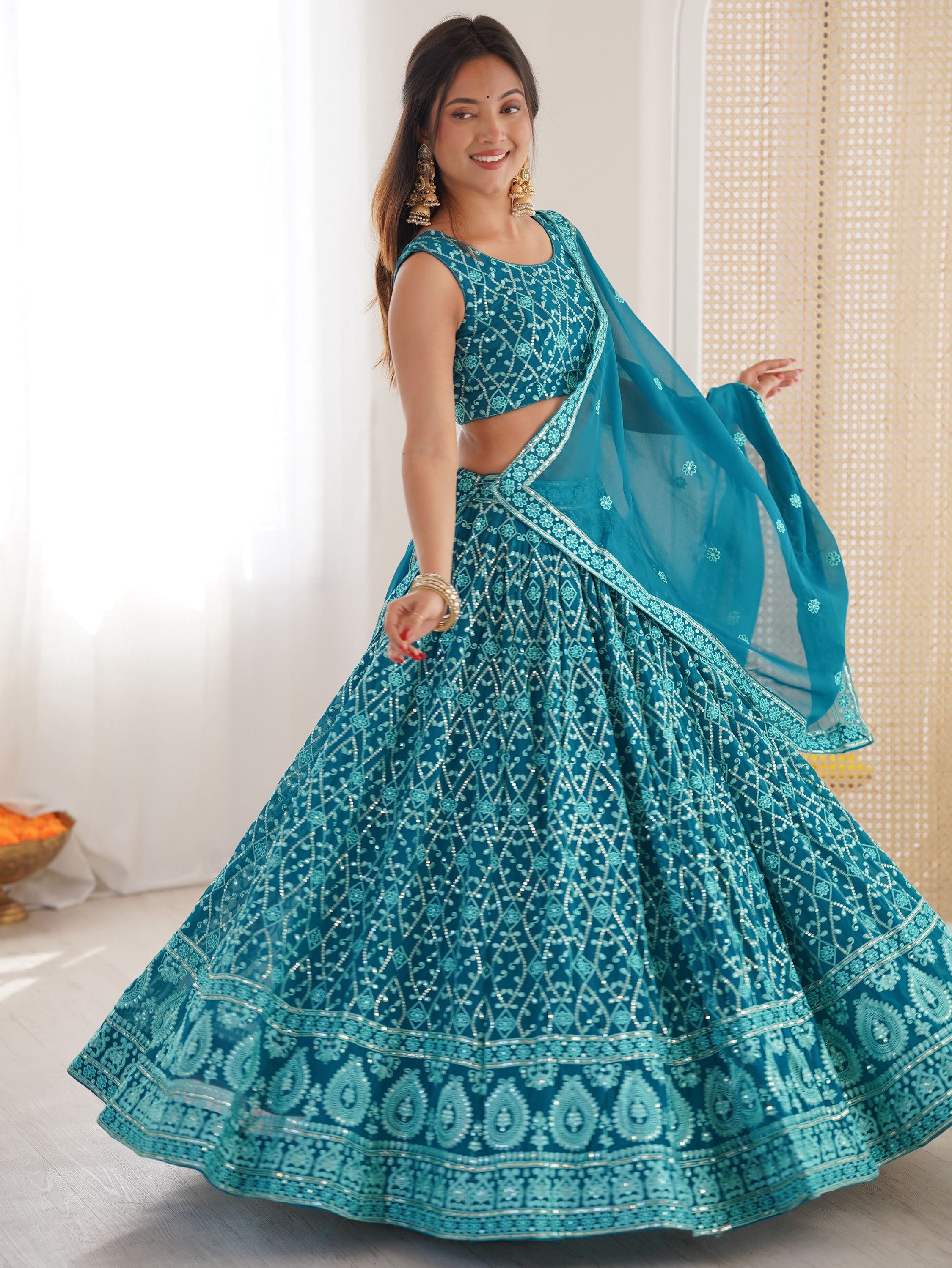 Dazzling Teal Blue Thread Work Georgette Function Wear Lehenga Choli