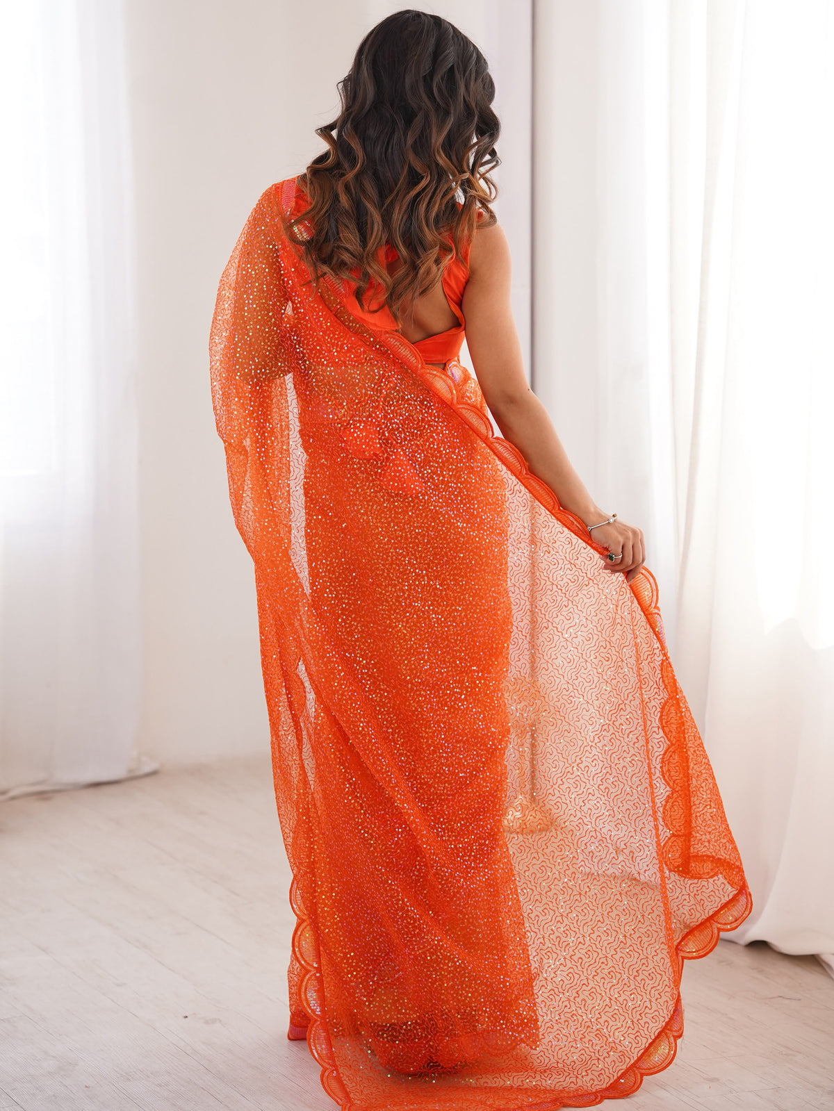 Captivating Orange Sequins Net Traditional Saree With Blouse