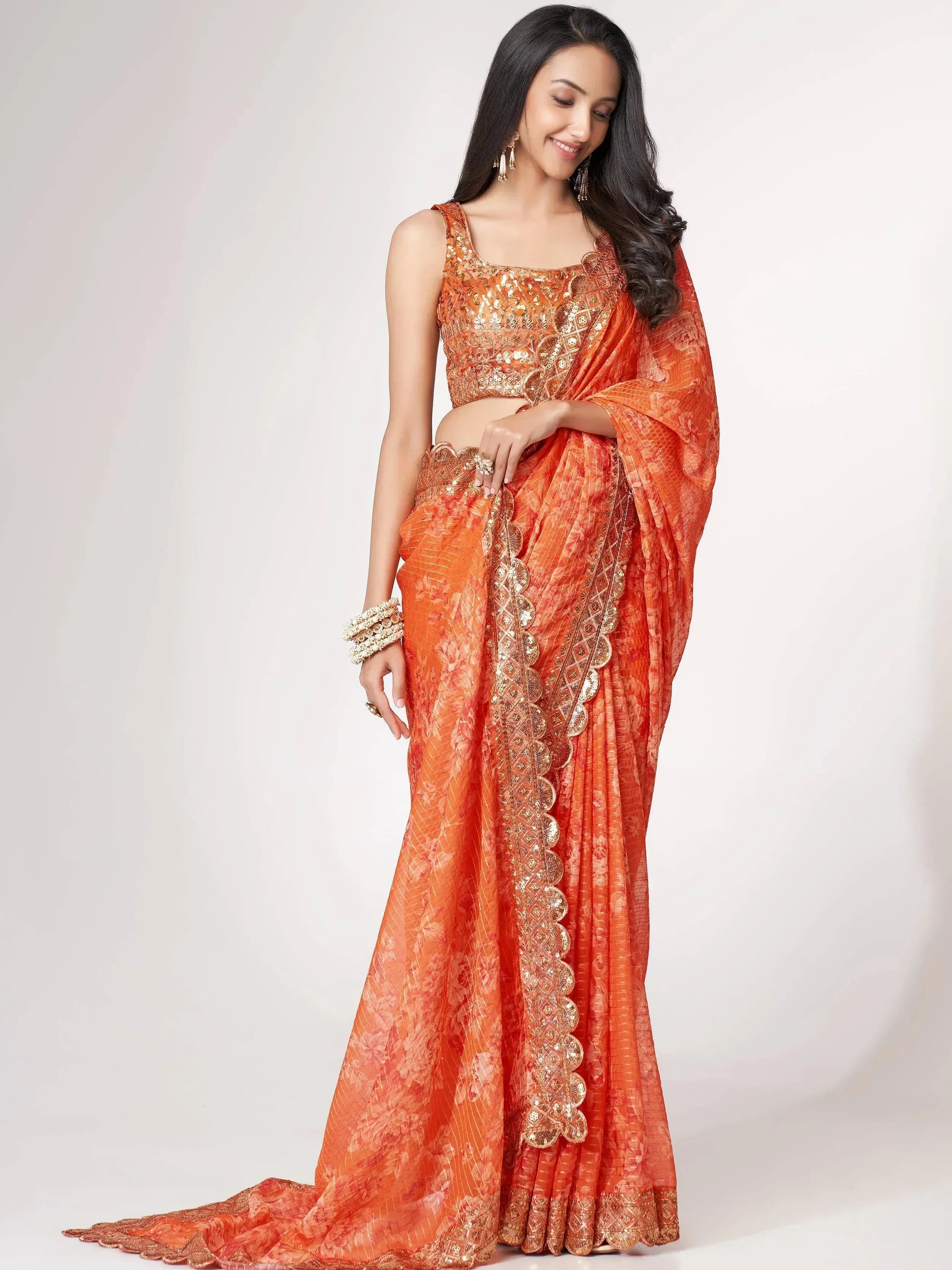Orange designer saree with gold embroidery and sequin blouse, ethnic Indian wear