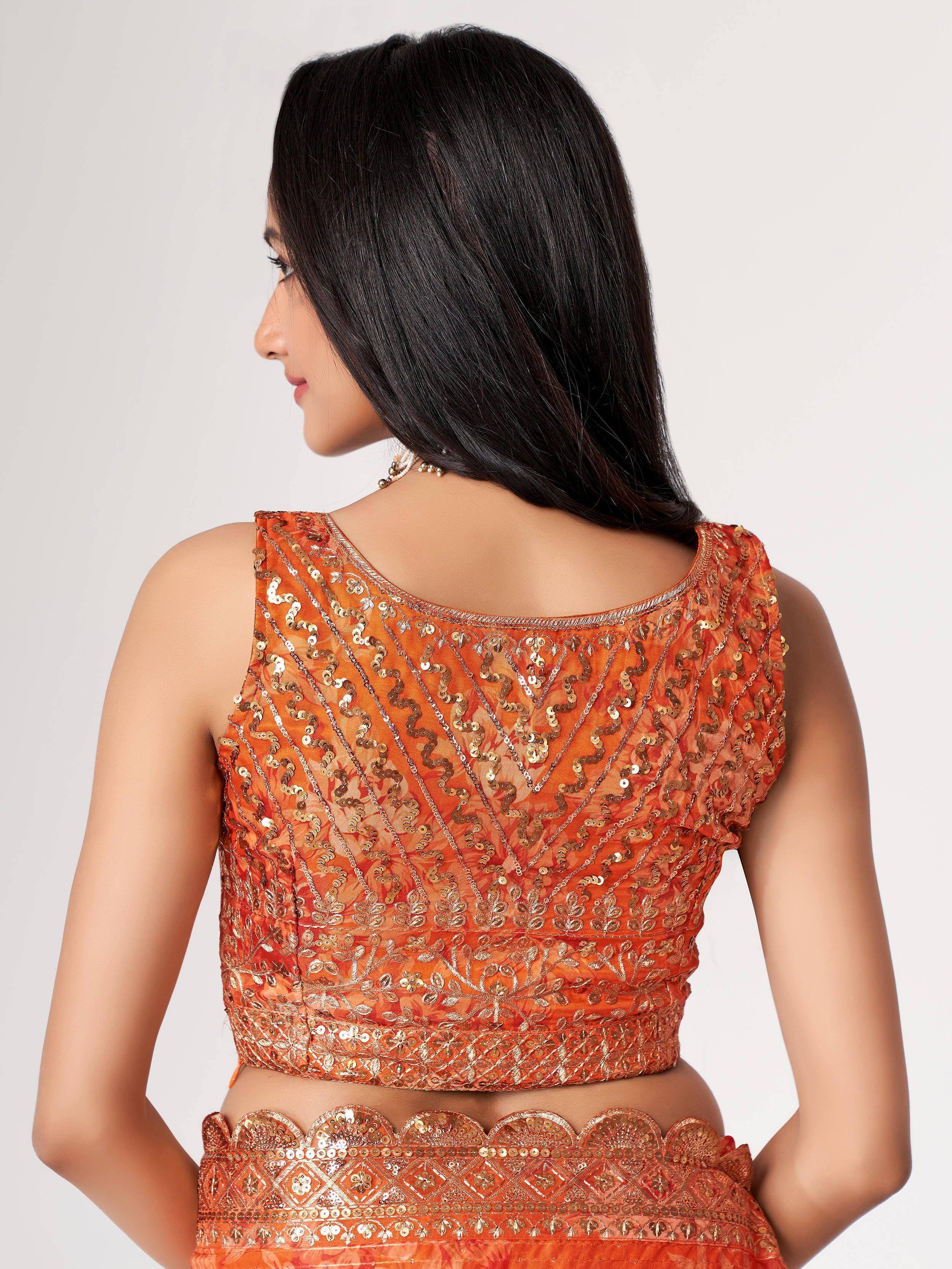 Orange sequin-embellished designer lehenga choli back view, ethnic wear for women