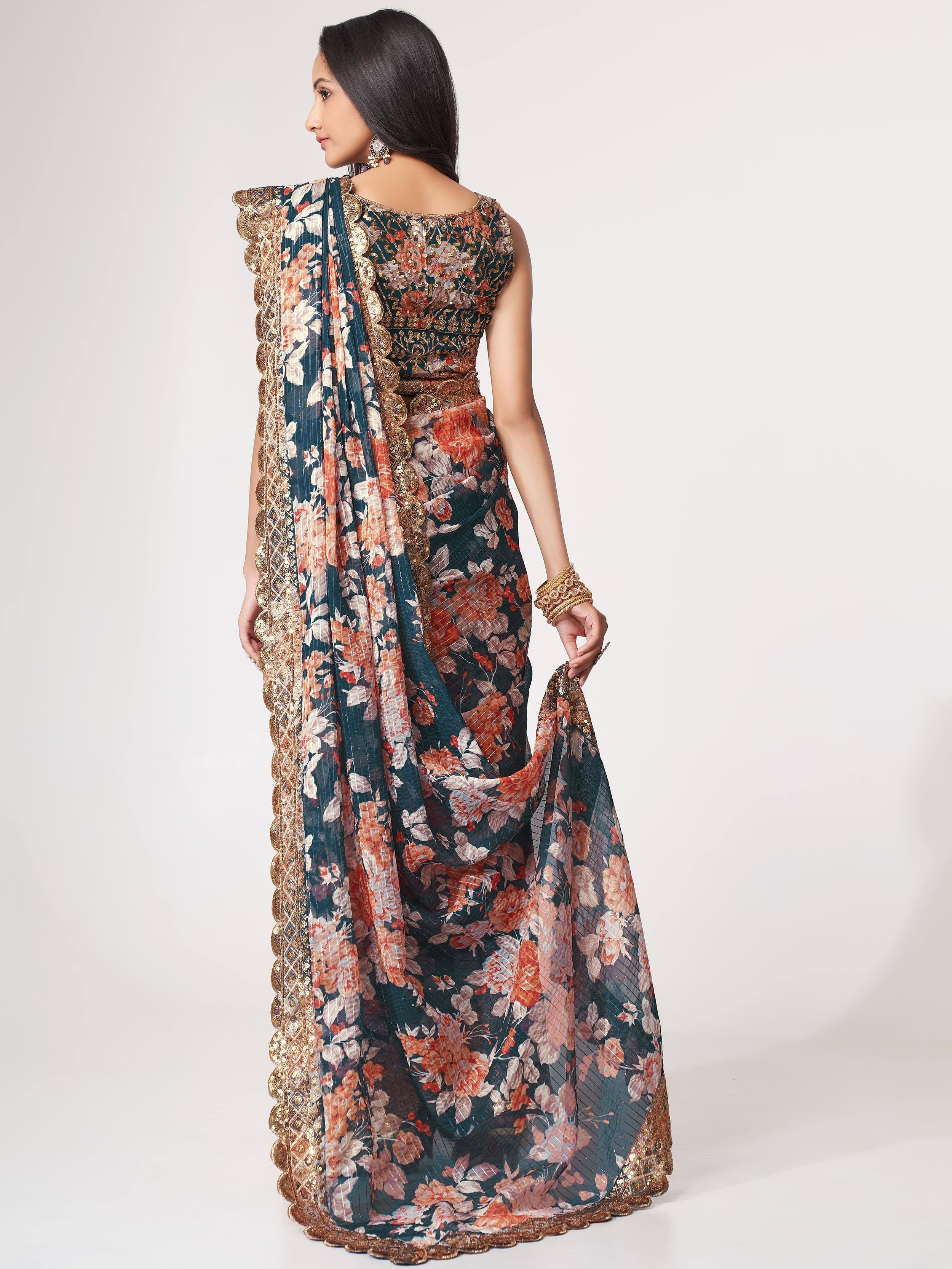 Floral print Indian saree with gold embroidery, perfect for ethnic occasions and festive wear.