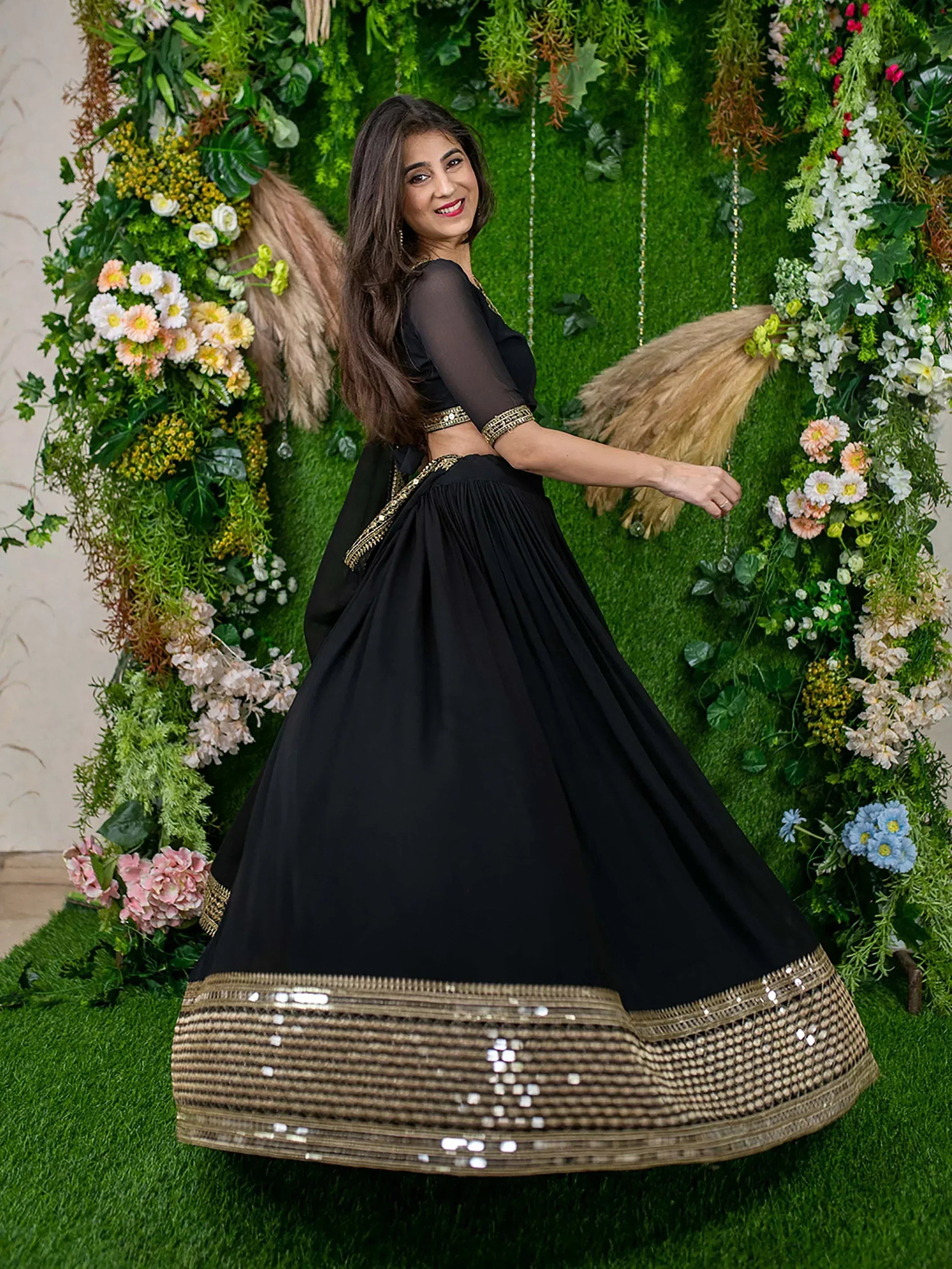 Black designer lehenga choli with gold sequin border, perfect for Indian ethnic wear events