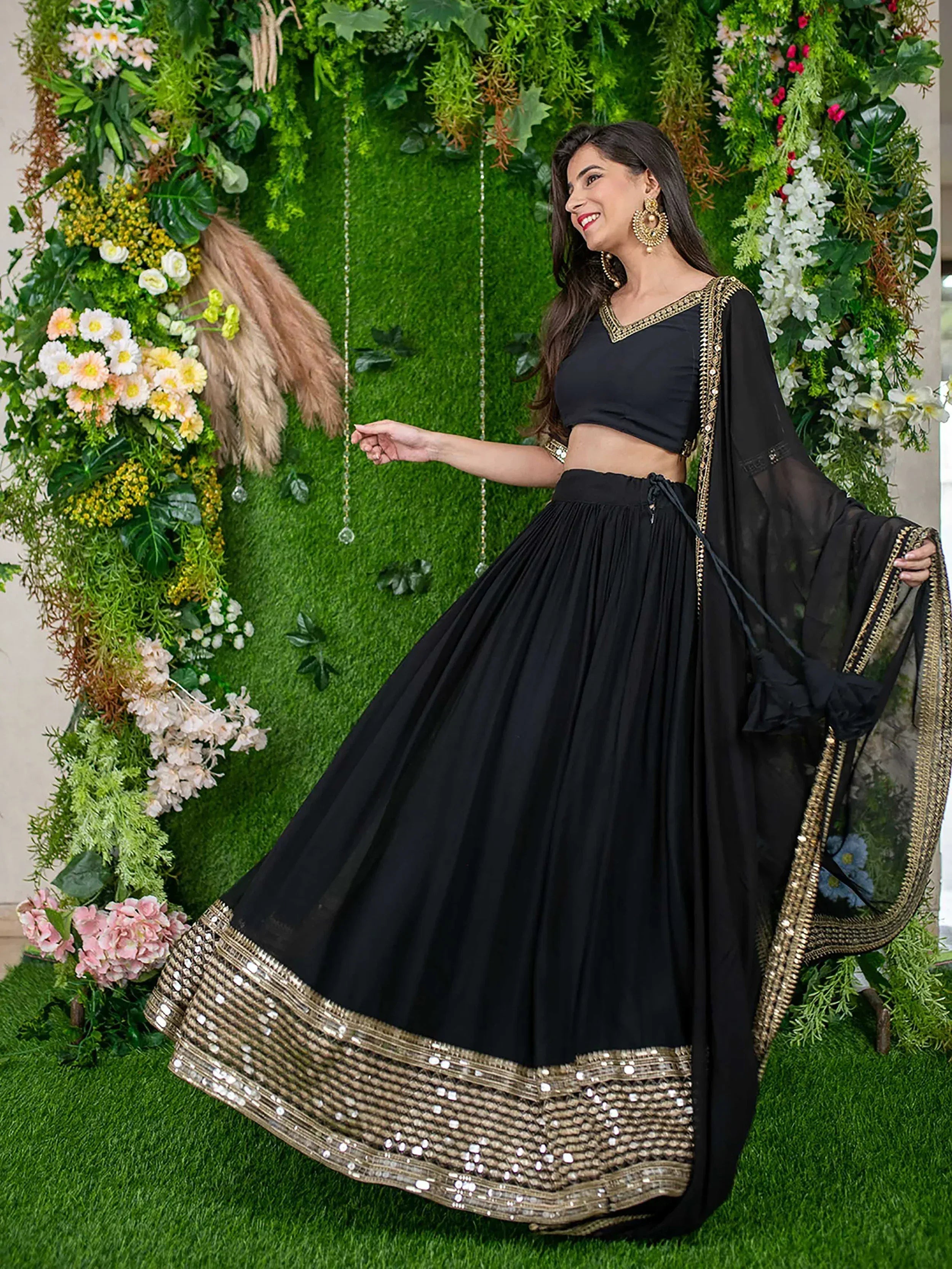 Black lehenga choli with gold embroidery, perfect for Indian ethnic wear events