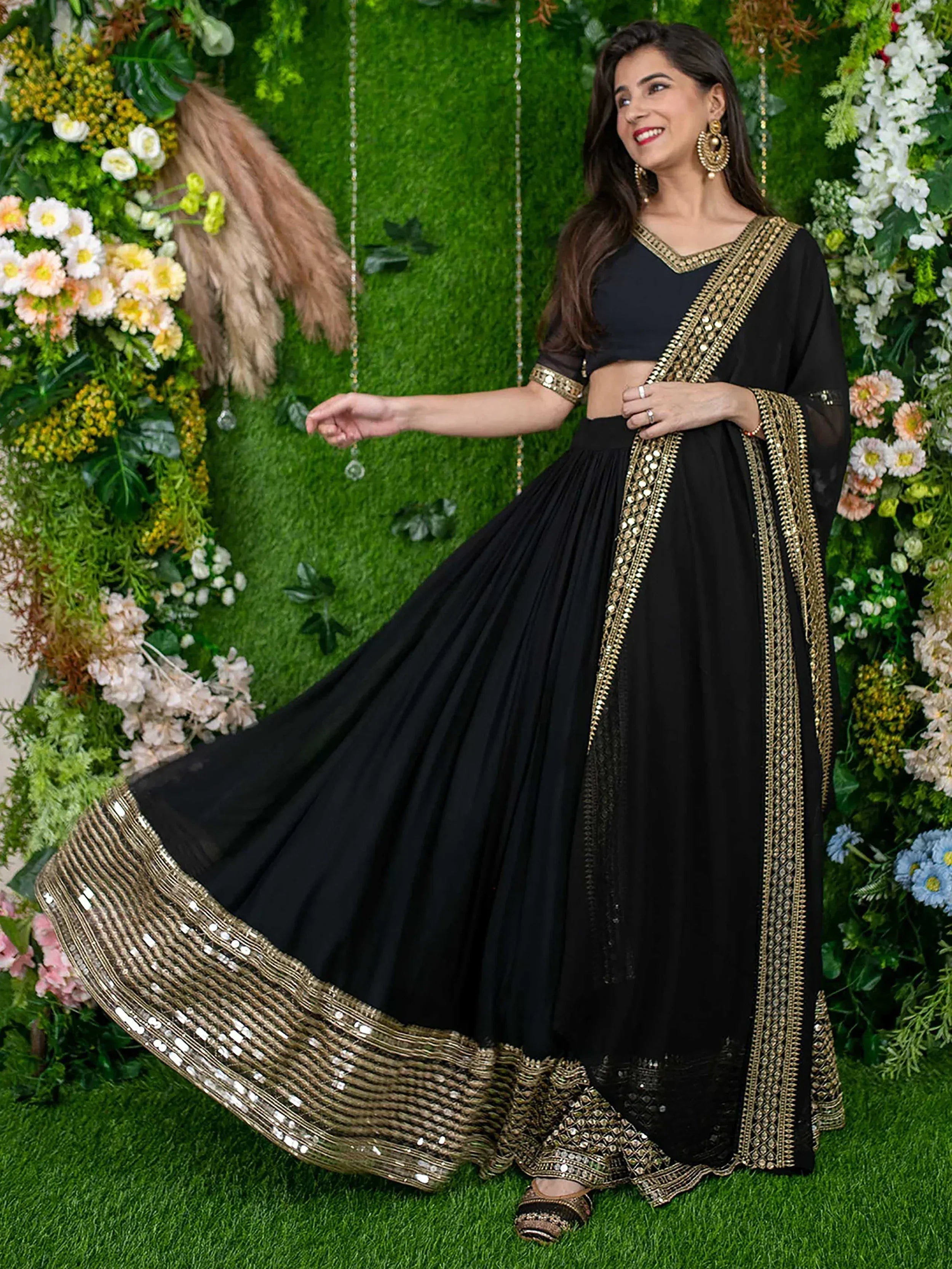 Black lehenga choli with gold mirror work, perfect for Indian ethnic wear events