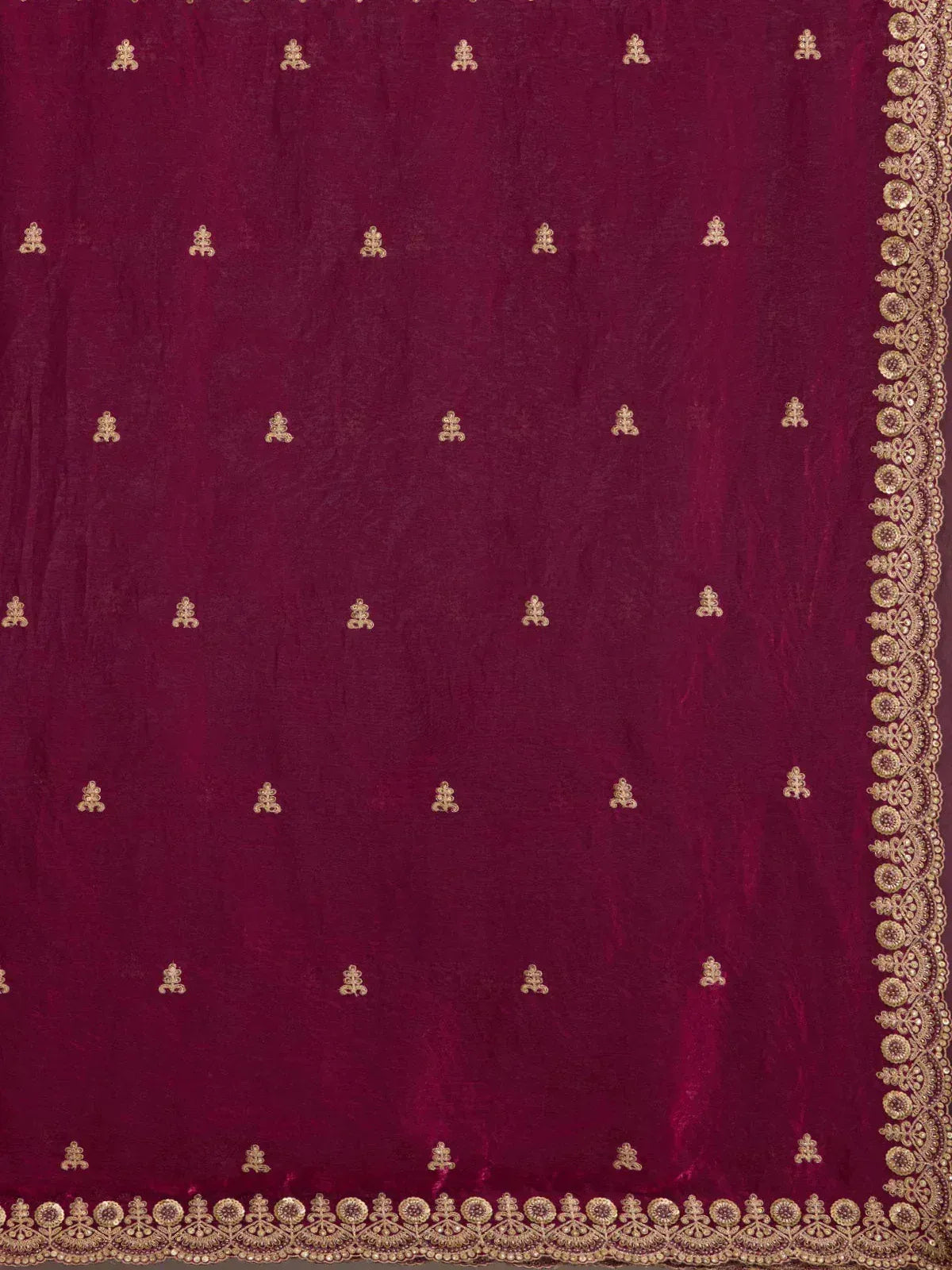 Rich maroon ethnic fabric with gold embroidery and intricate border design for lehenga or saree