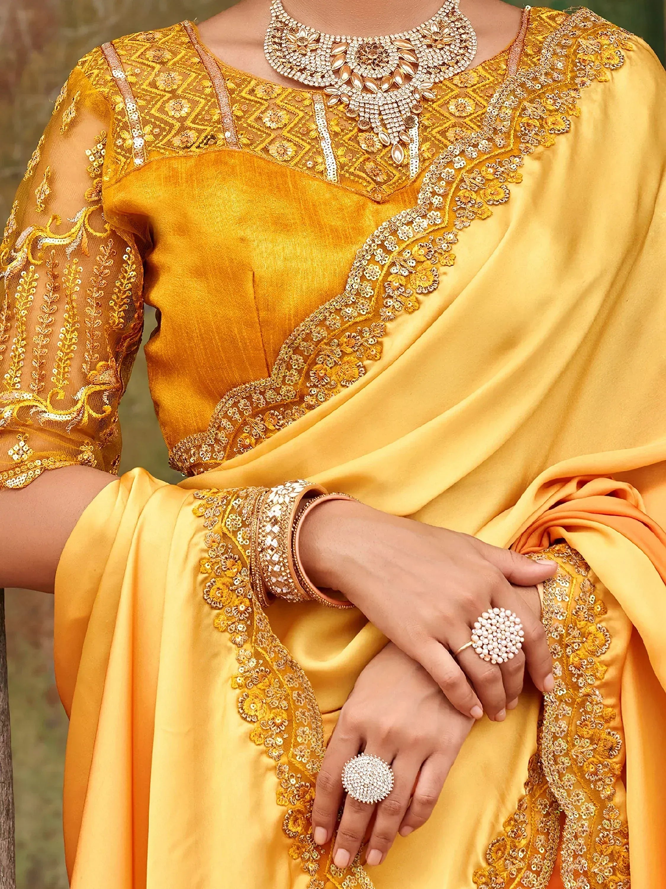 Dazzling Alphanso Yellow Sequined Satin Festive Wear Saree With Blouse