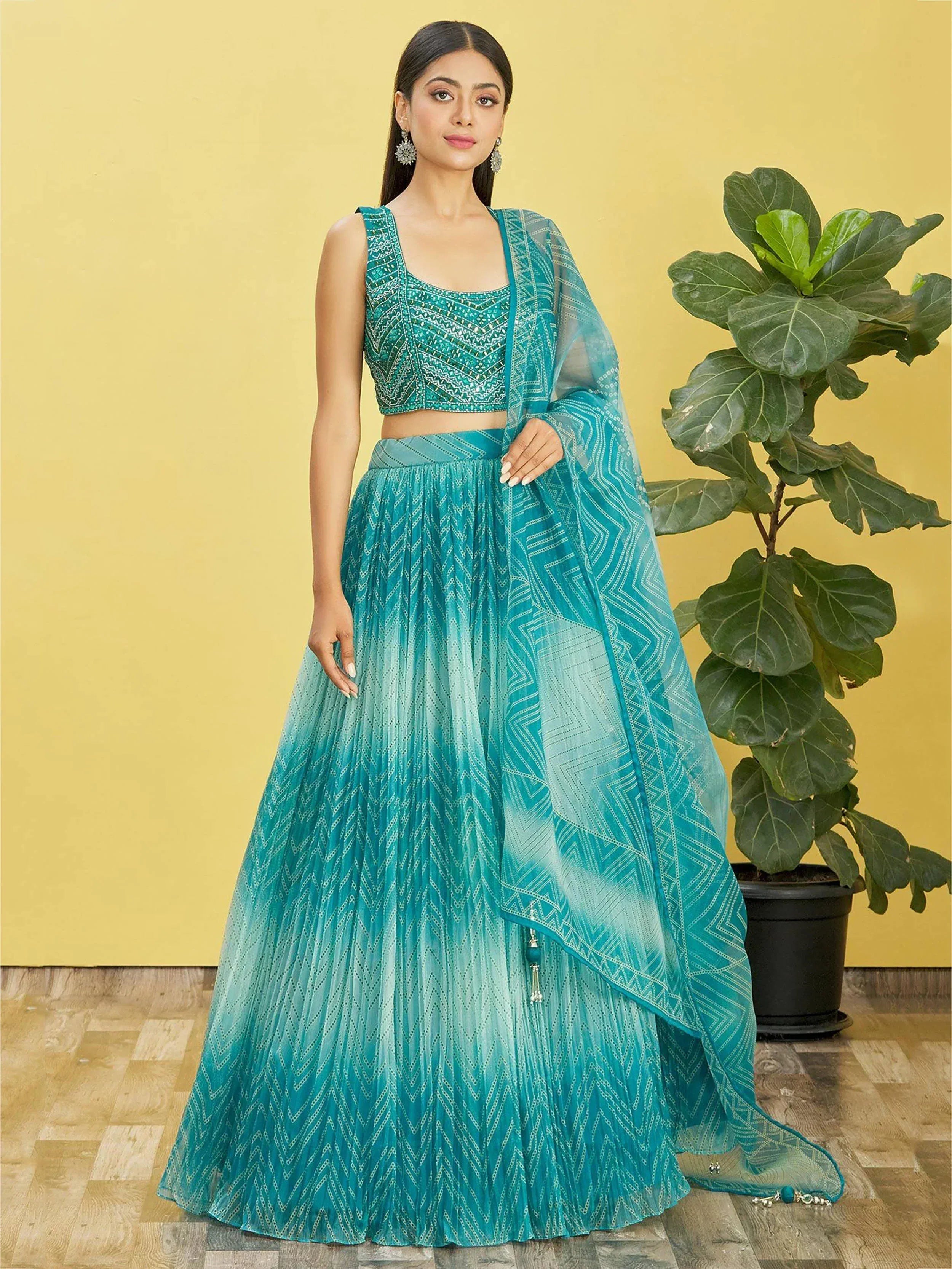 Teal embroidered lehenga choli with geometric print and sheer dupatta, Indian ethnic wear