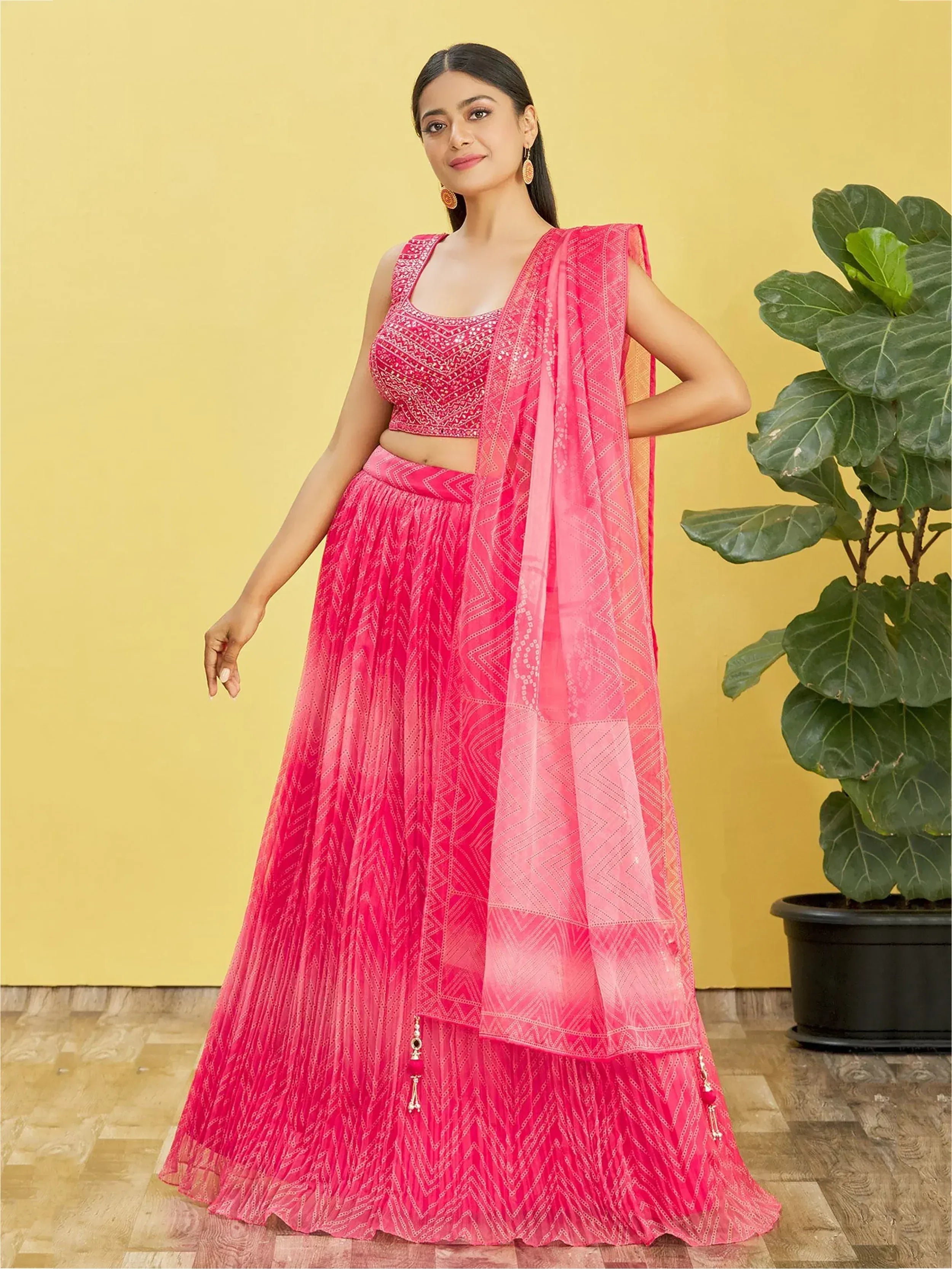 Pink embroidered lehenga choli with geometric print and sheer dupatta, Indian ethnic wear