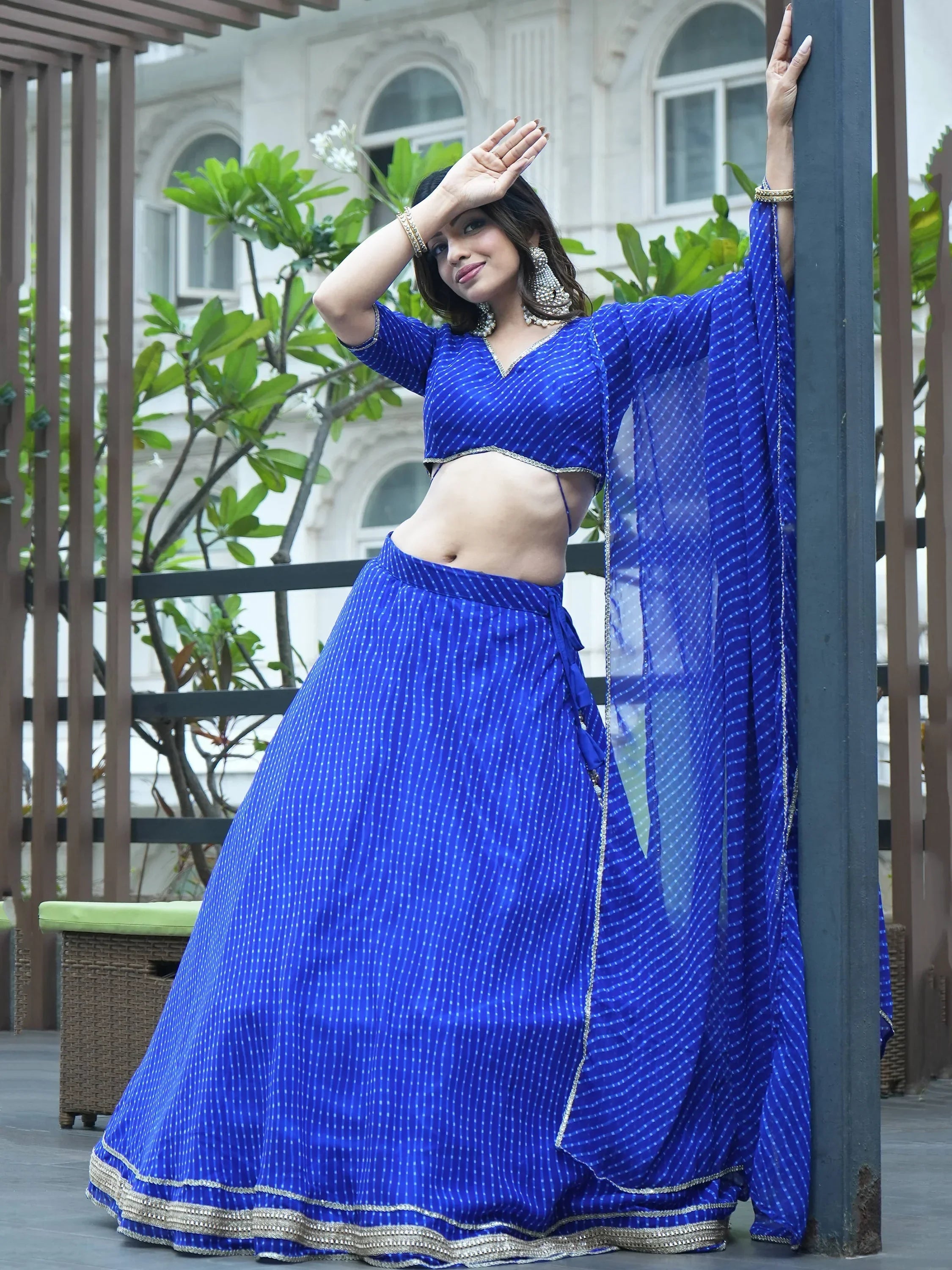 Ravishing Blue Laheriya Printed Georgette Wedding Lehenga Choli