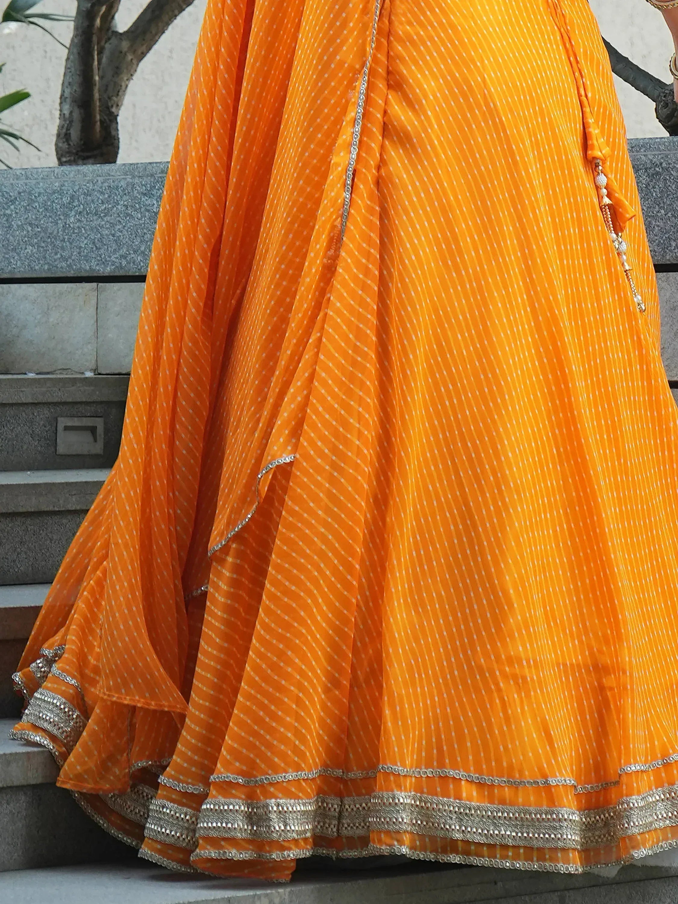 Amazing Orange Laheriya Print Georgette Haldi Wear Lehenga Choli