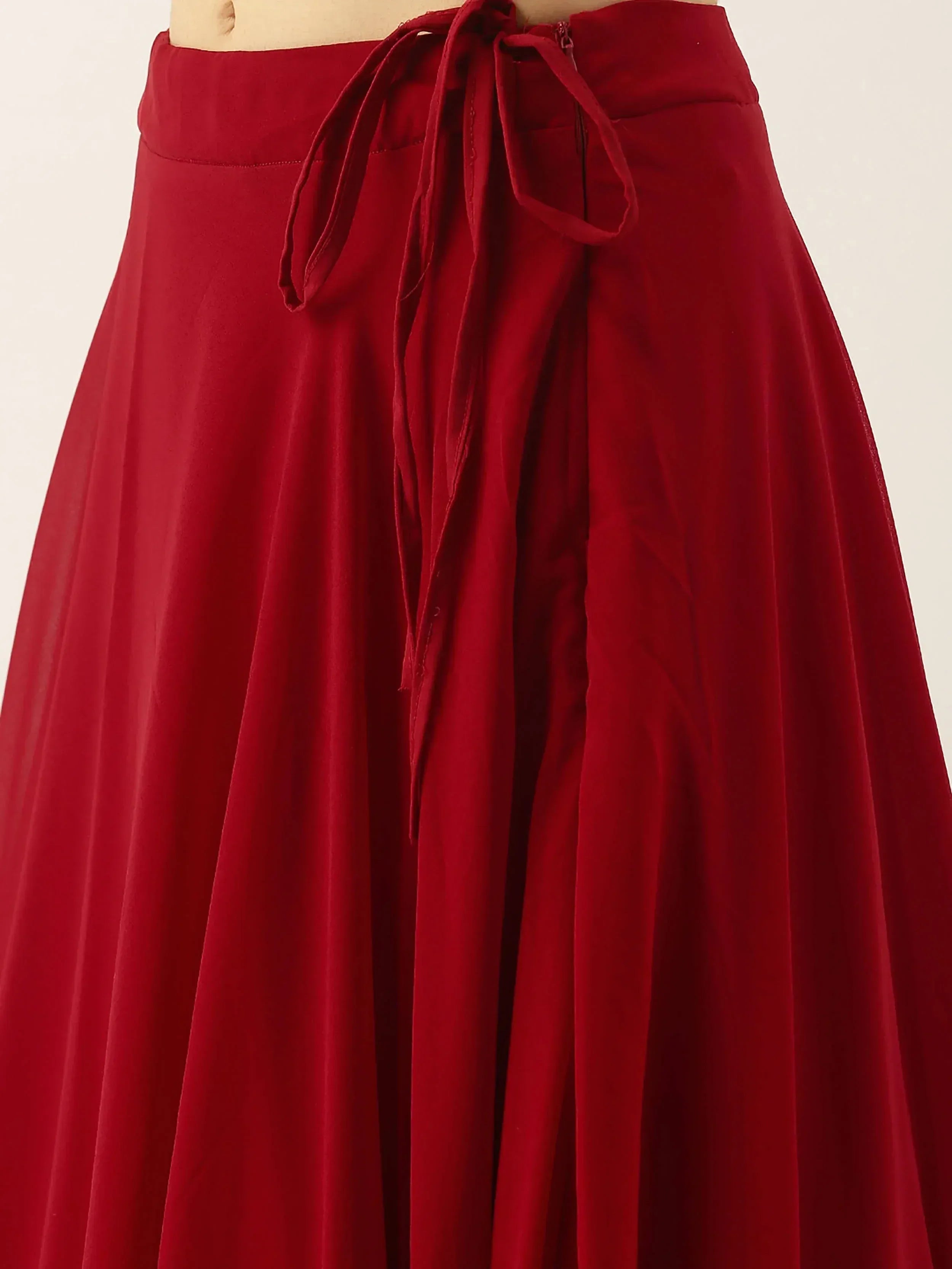 Red ethnic flared skirt with tie waist, perfect for lehenga choli or saree styling