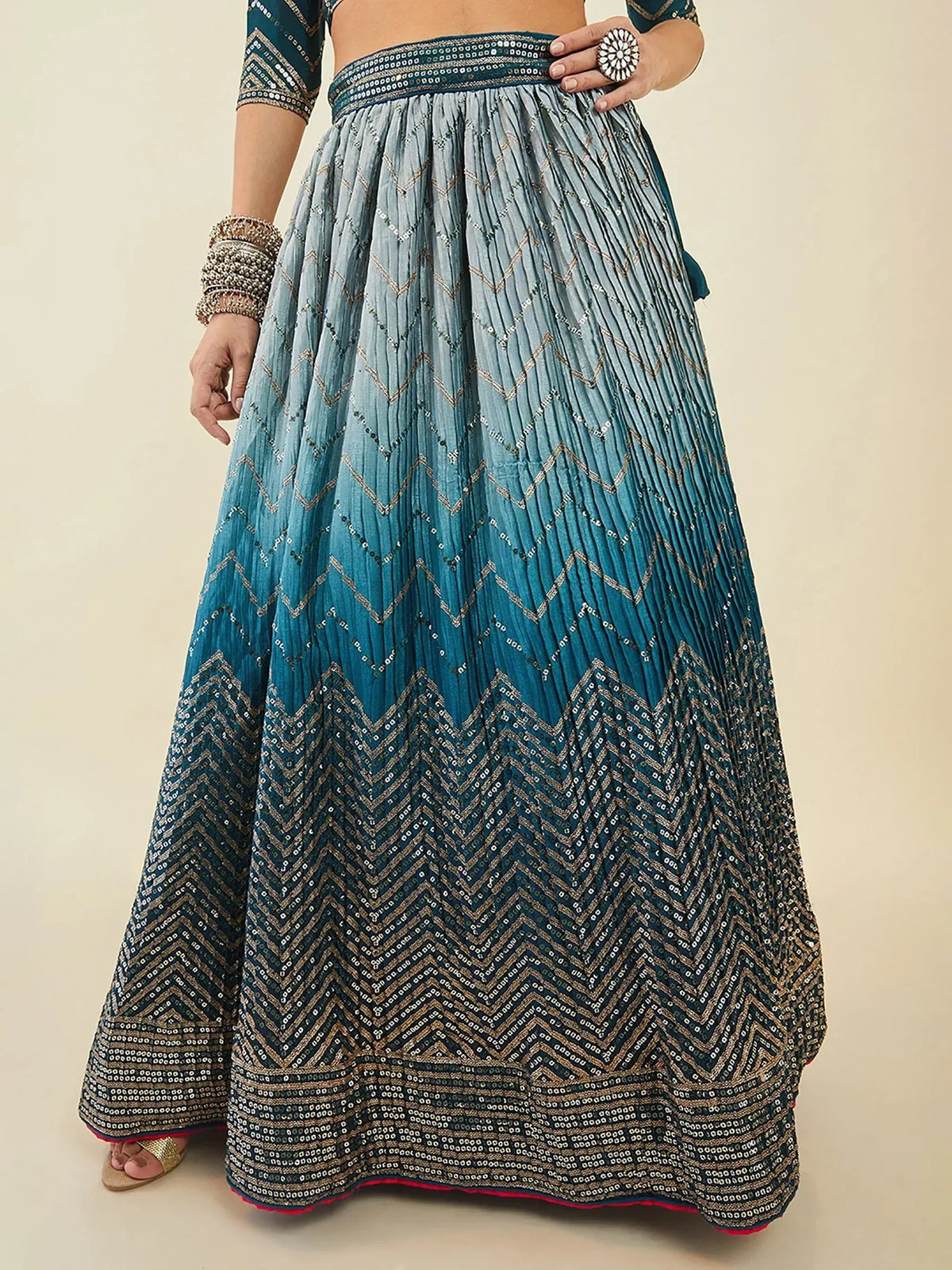 Blue ombre lehenga with zigzag sequin embroidery, perfect for Indian ethnic wear