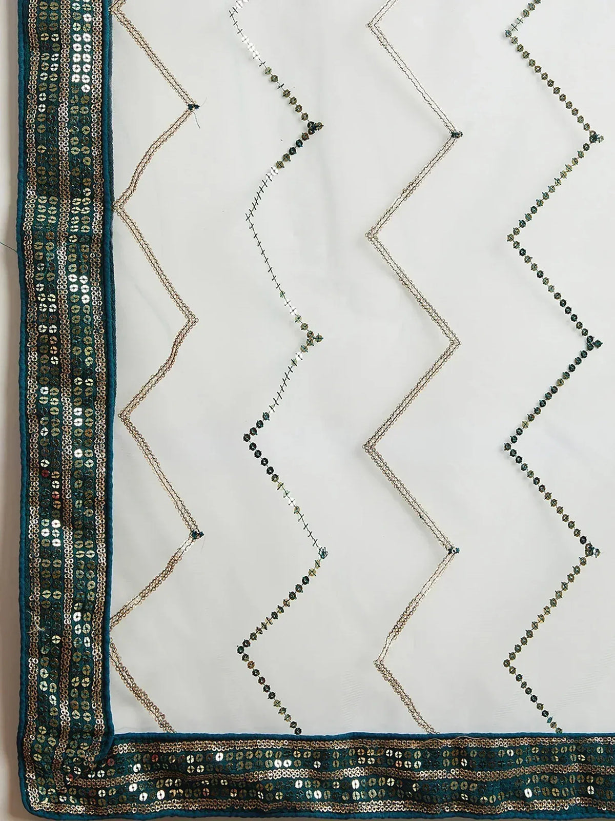Teal sequin border with gold thread embroidery on white fabric, ethnic wear detail
