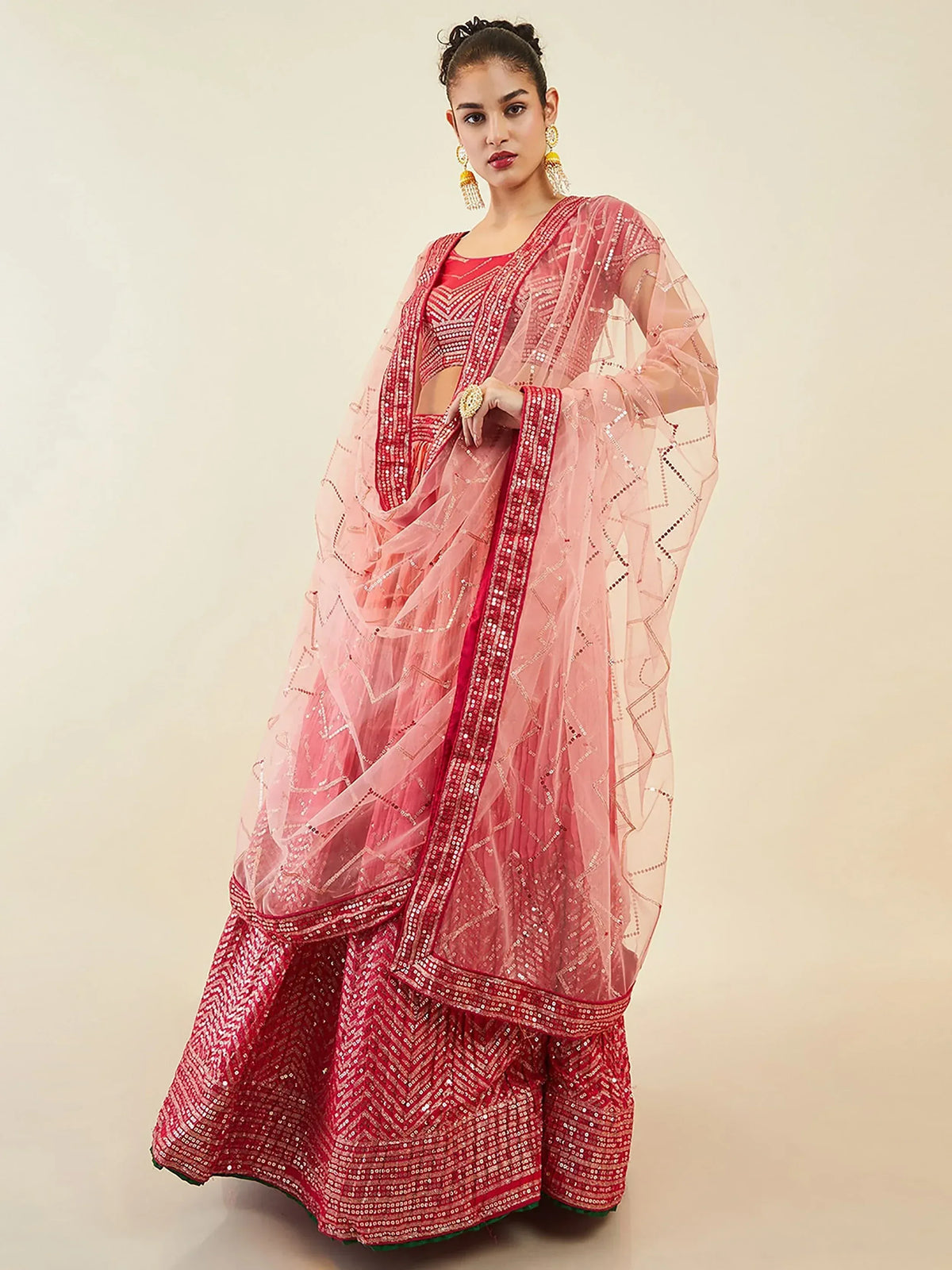Elegant pink and red sequined lehenga choli with sheer dupatta for Indian ethnic wear