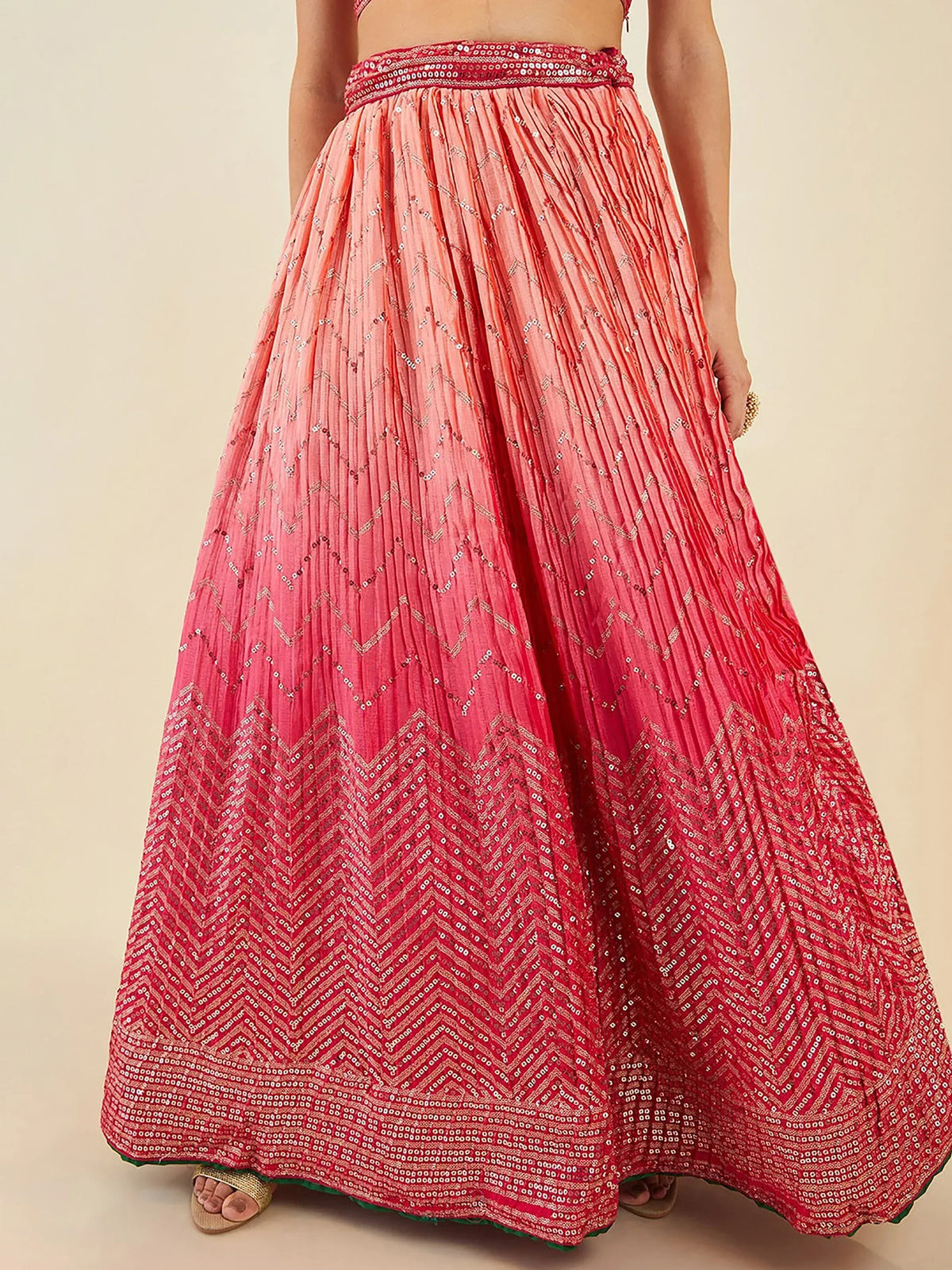 Pink pleated lehenga skirt with sequin chevron patterns, ideal for Indian ethnic wear