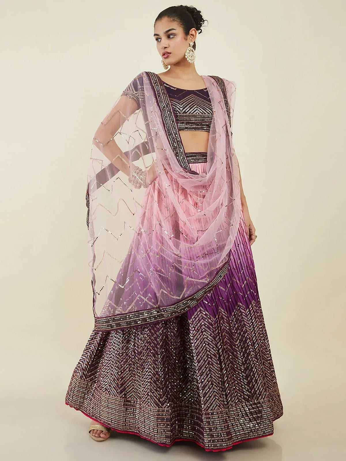 Purple and pink ombre lehenga choli with sequin chevron pattern, sheer dupatta, and embellished crop top for Indian ethnic wear