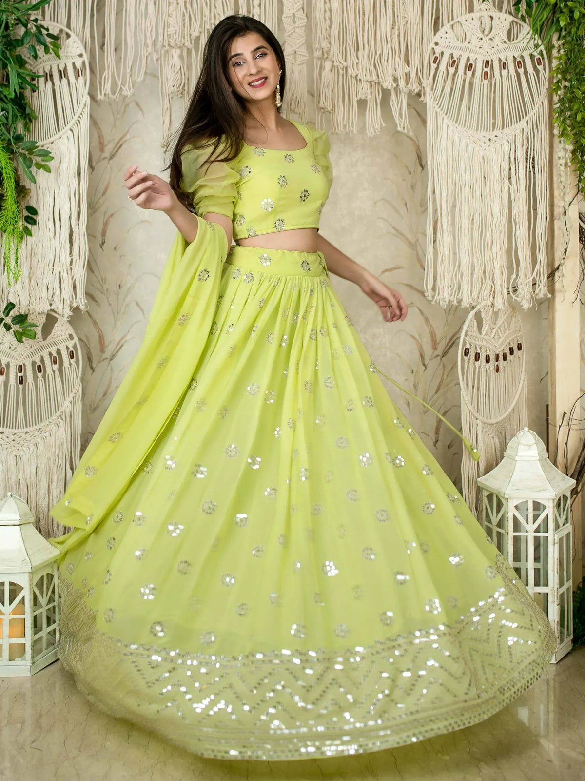Lime green lehenga choli with silver mirror work and floral embroidery for festive occasions