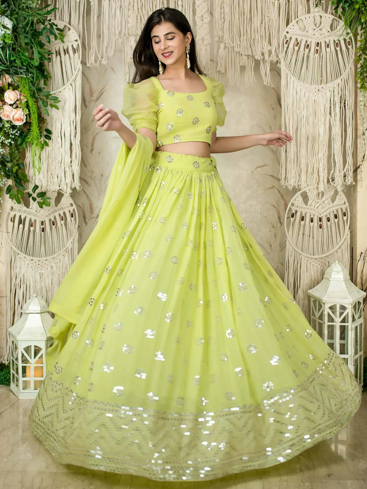 Lime green lehenga choli with mirror work and puff sleeves for festive occasions