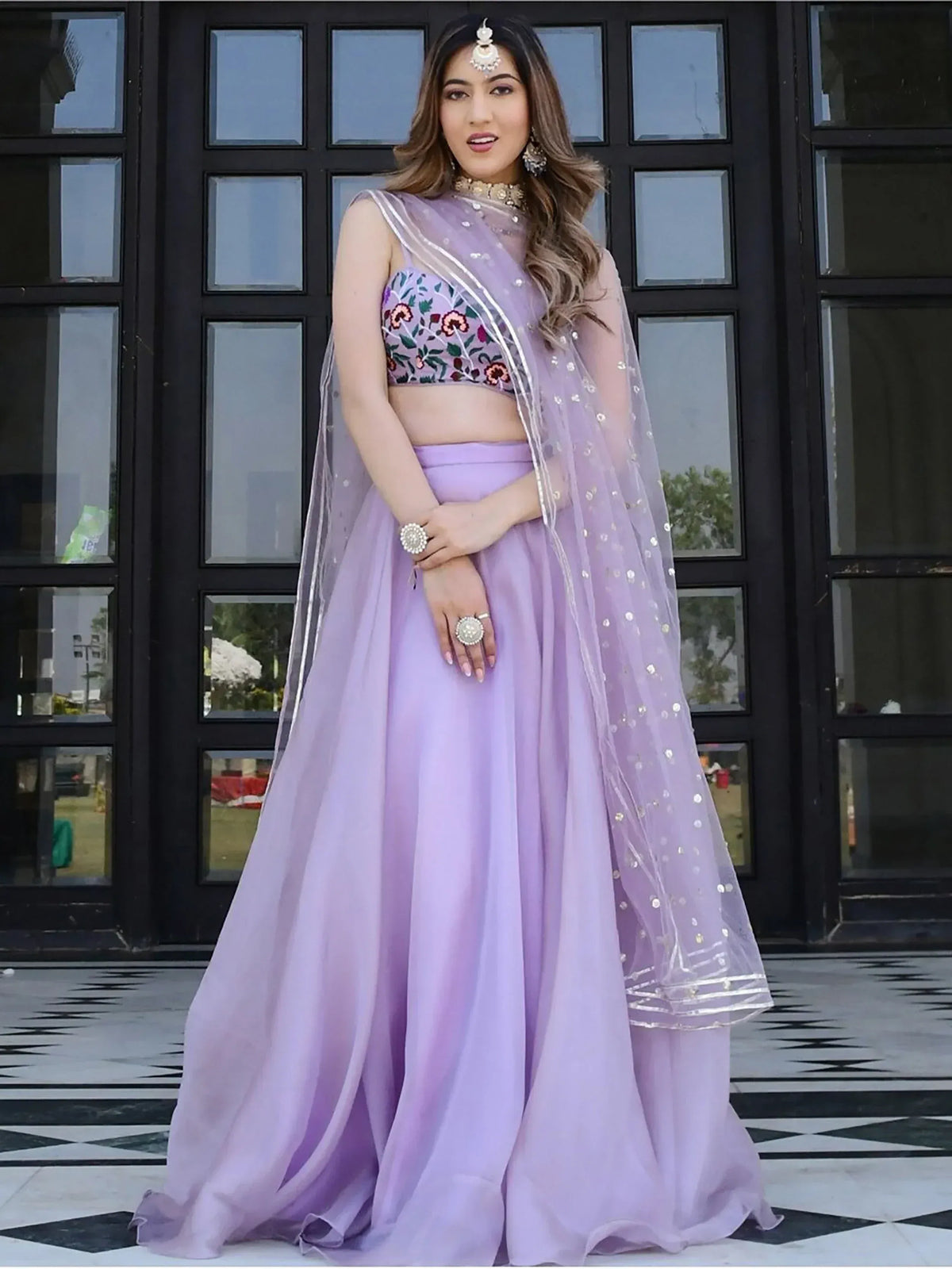 Lavender lehenga choli with floral embroidery and sheer dupatta, perfect for Indian ethnic occasions