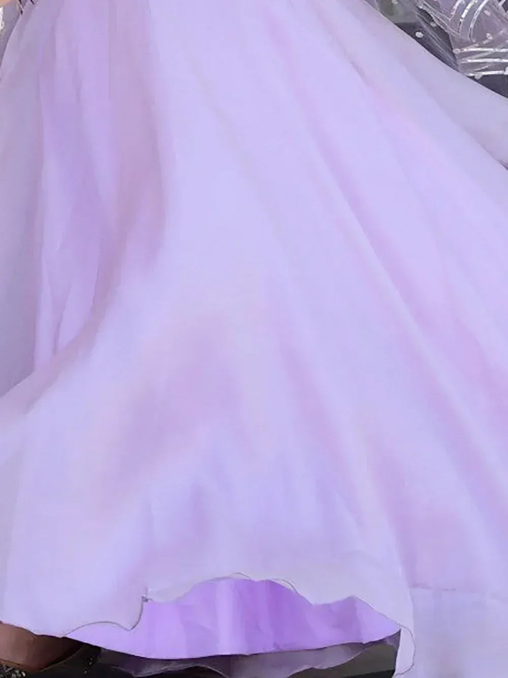 Lavender ethnic gown with layered tulle skirt and scalloped hem, perfect for Indian festive wear