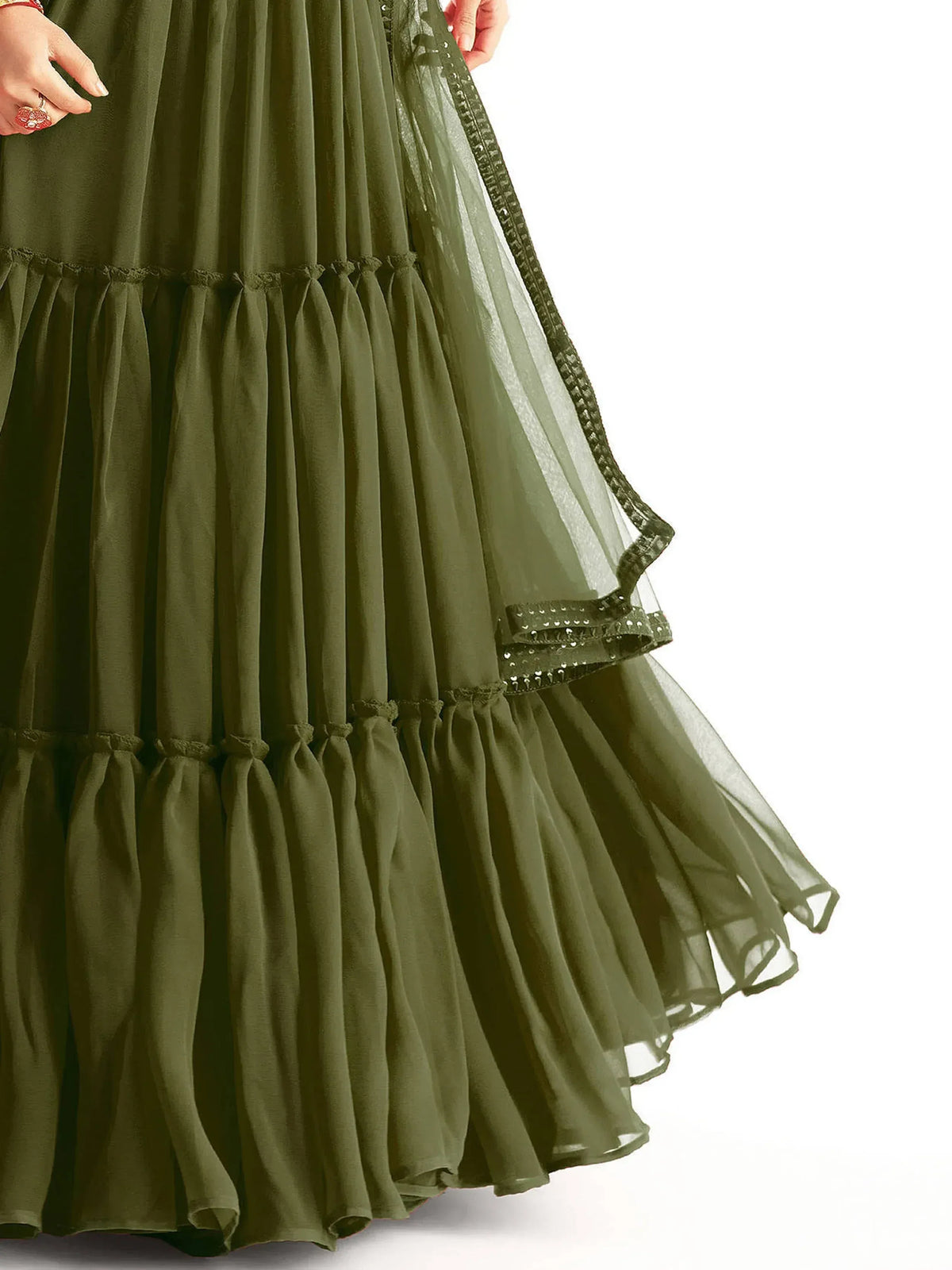 Olive green tiered ethnic gown with sheer overlay and sequin trim, perfect for Indian festive wear.