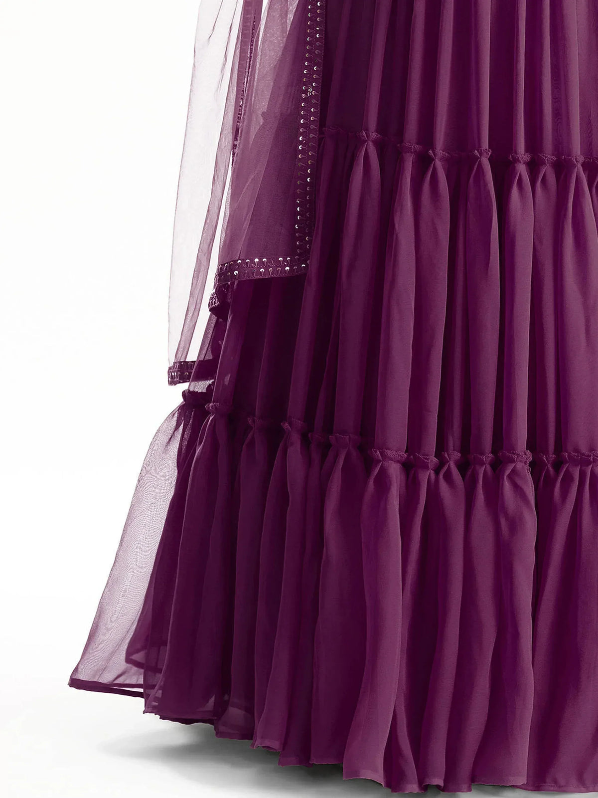 Purple tiered ethnic gown with sheer overlay and embellished trim, perfect for festive occasions.
