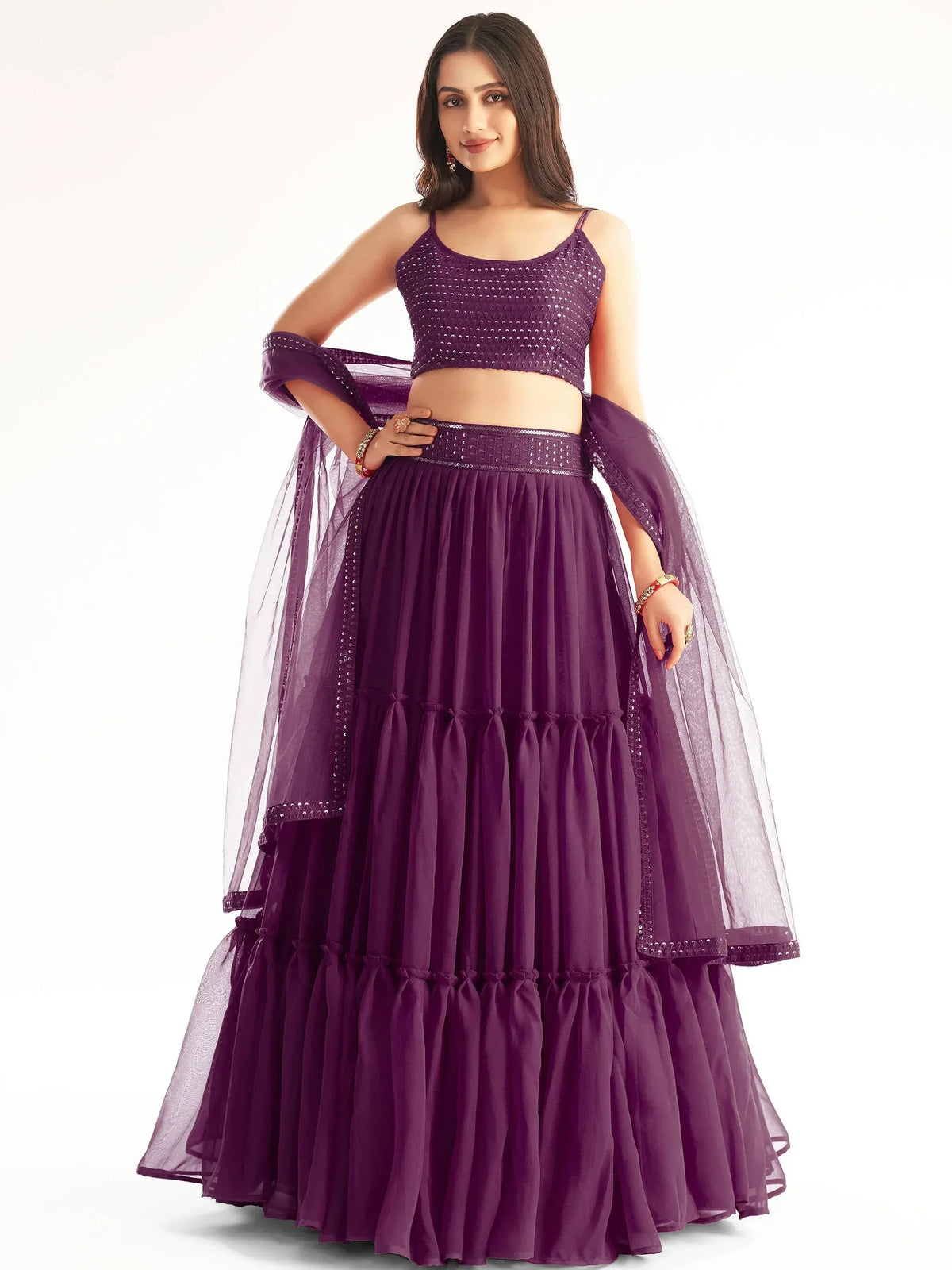 Purple sequin lehenga choli with sheer dupatta, perfect for Indian ethnic wear and festive occasions.