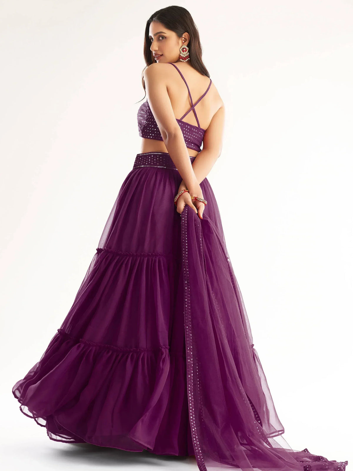 Purple designer lehenga choli with sequin top and layered skirt, perfect for Indian ethnic wear events