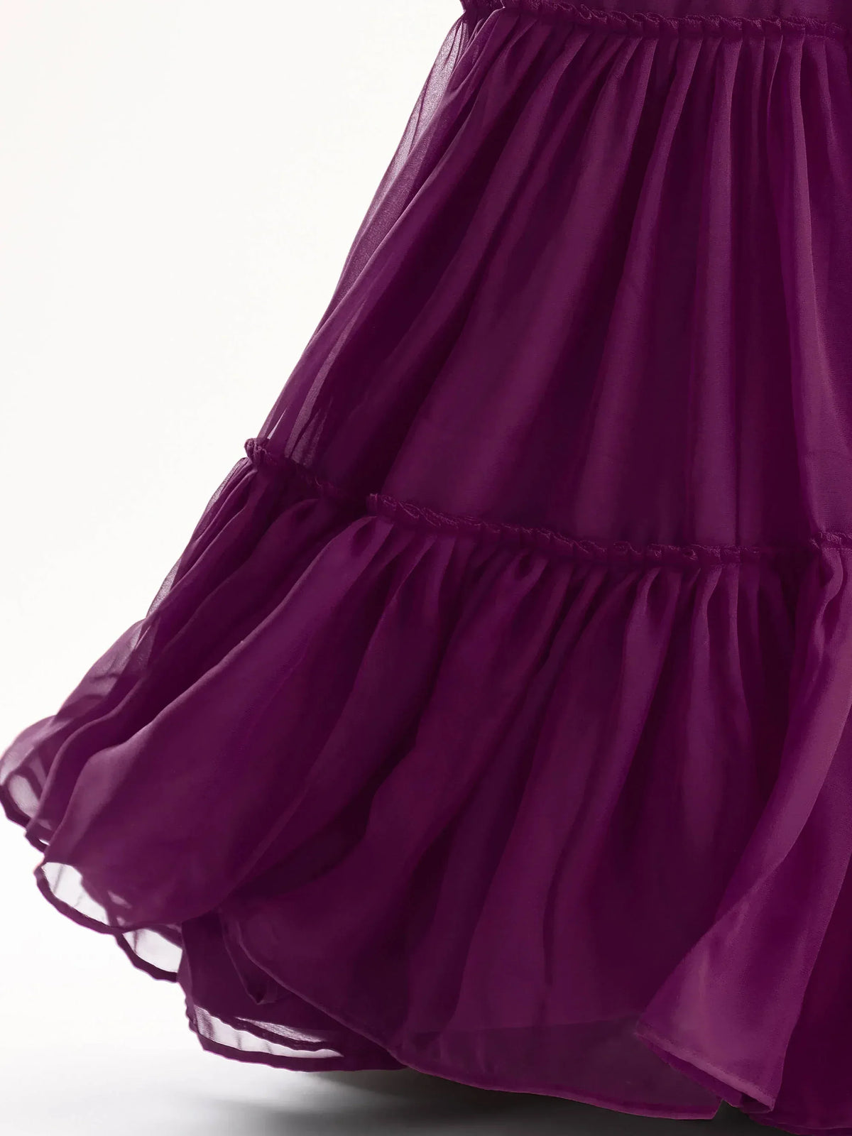 Purple tiered ethnic gown with ruffled layers, perfect for Indian occasions