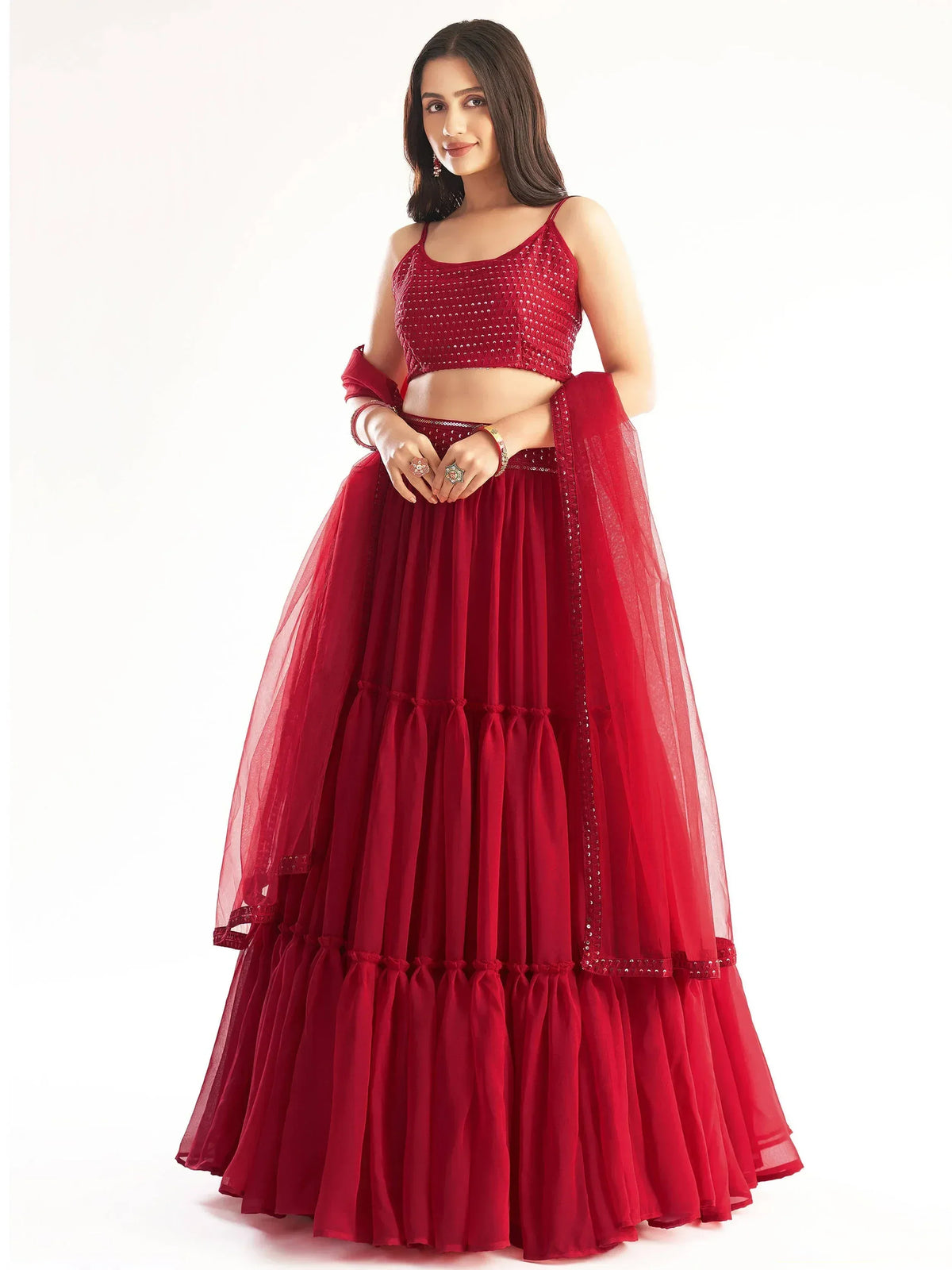 Red designer lehenga choli with sequin top and layered skirt for ethnic wear