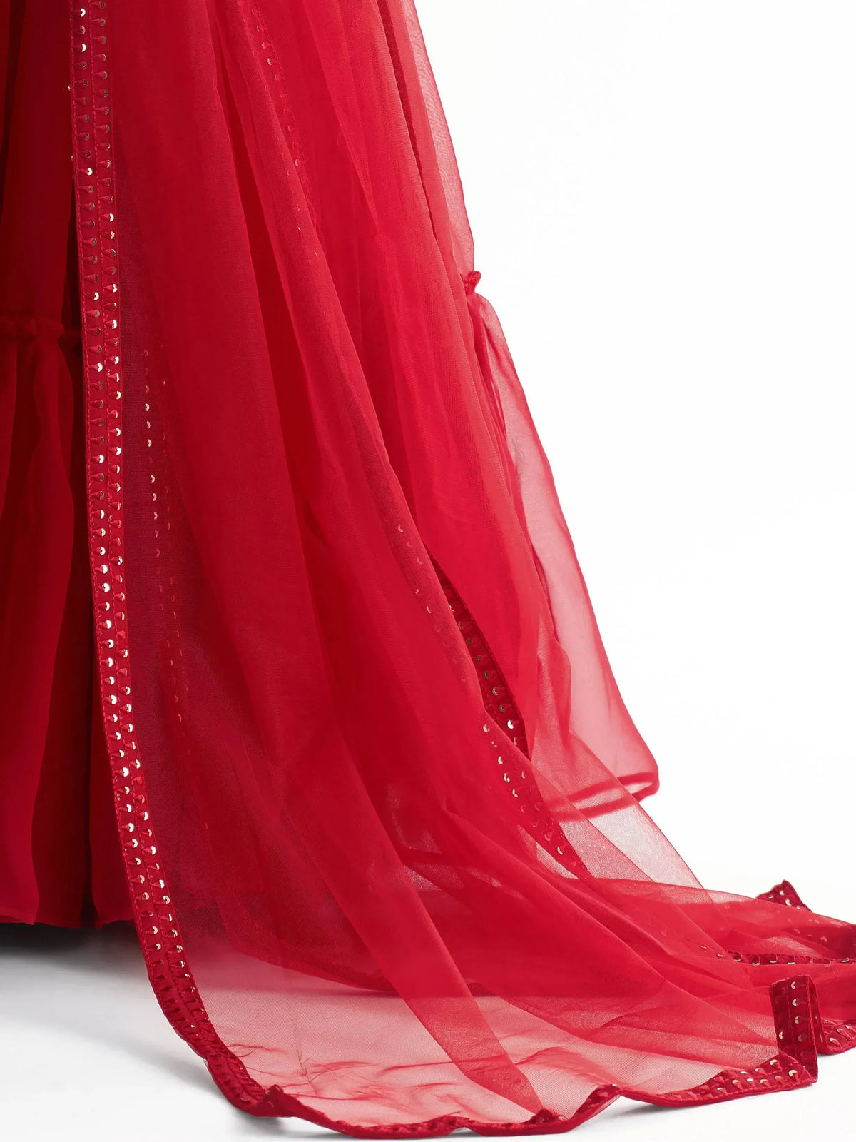 Red sheer ethnic gown with sequin trim, flowing fabric for festive occasions