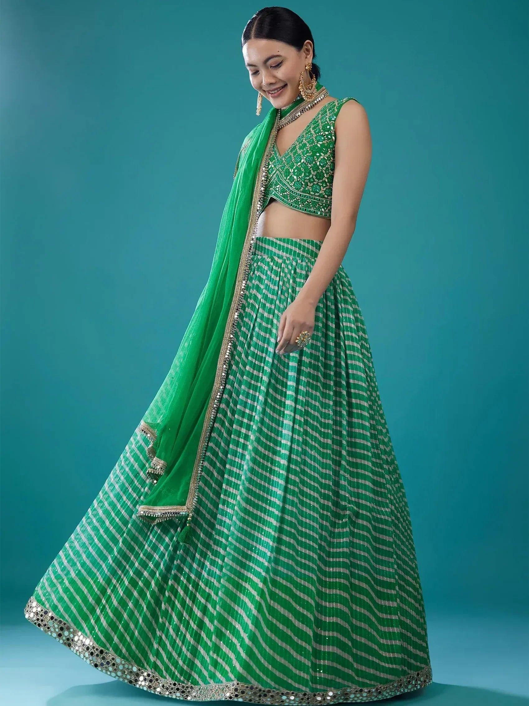 Green striped lehenga choli with embroidered blouse and dupatta, perfect for Indian ethnic wear