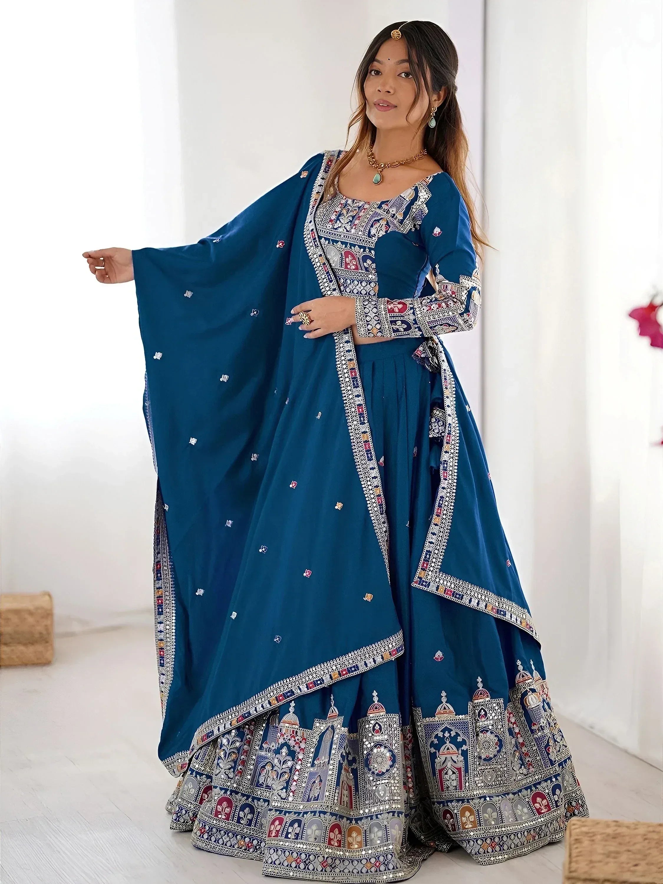Teal blue embroidered lehenga choli with mirror work and dupatta, Indian ethnic wear for women