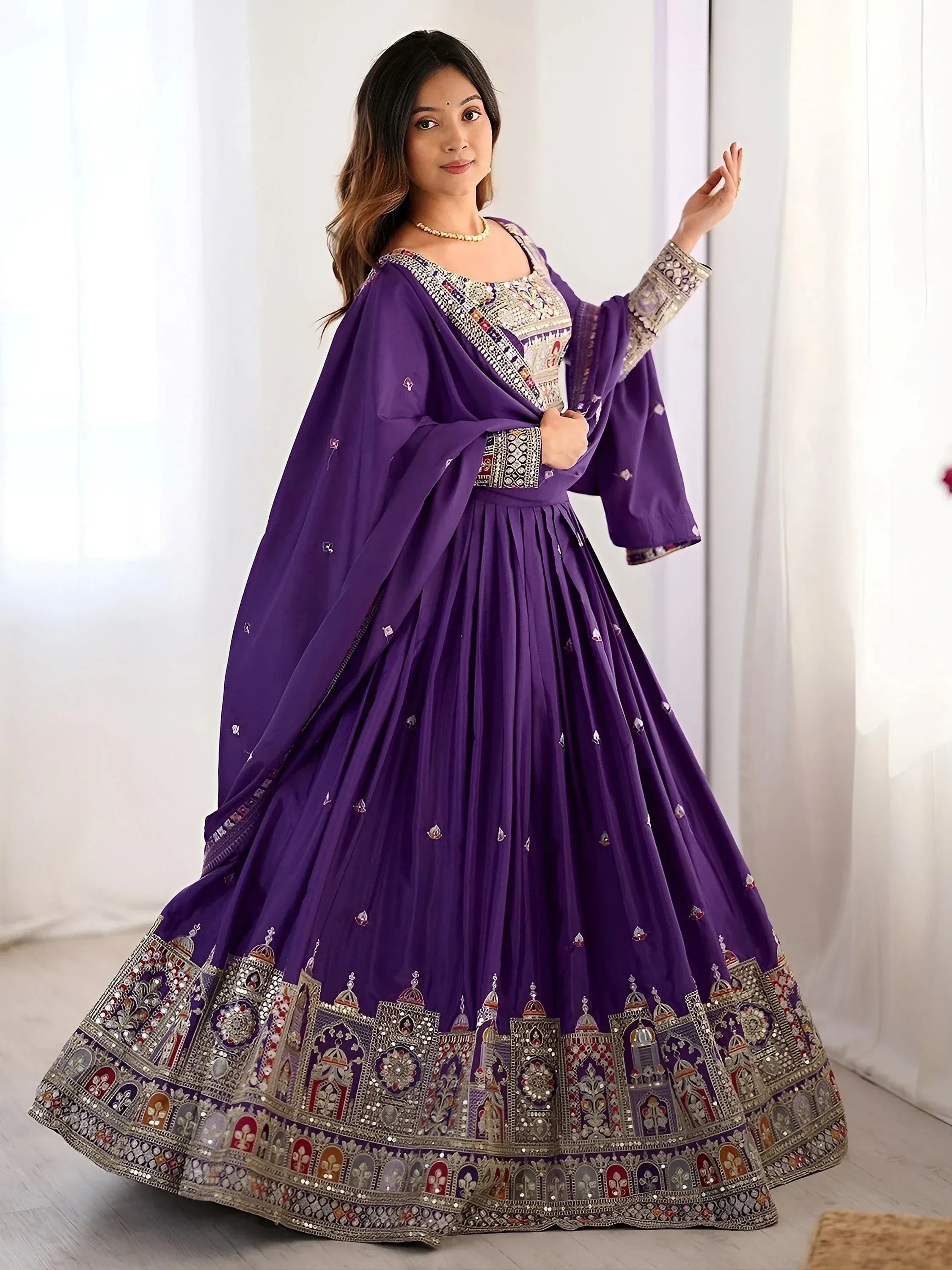 Purple embroidered lehenga choli with mirror work, perfect for Indian ethnic wear and festive occasions