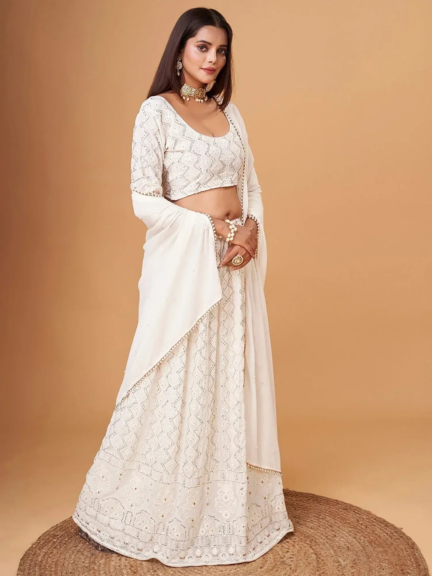 White embroidered lehenga choli with dupatta, ethnic Indian wear for weddings and parties